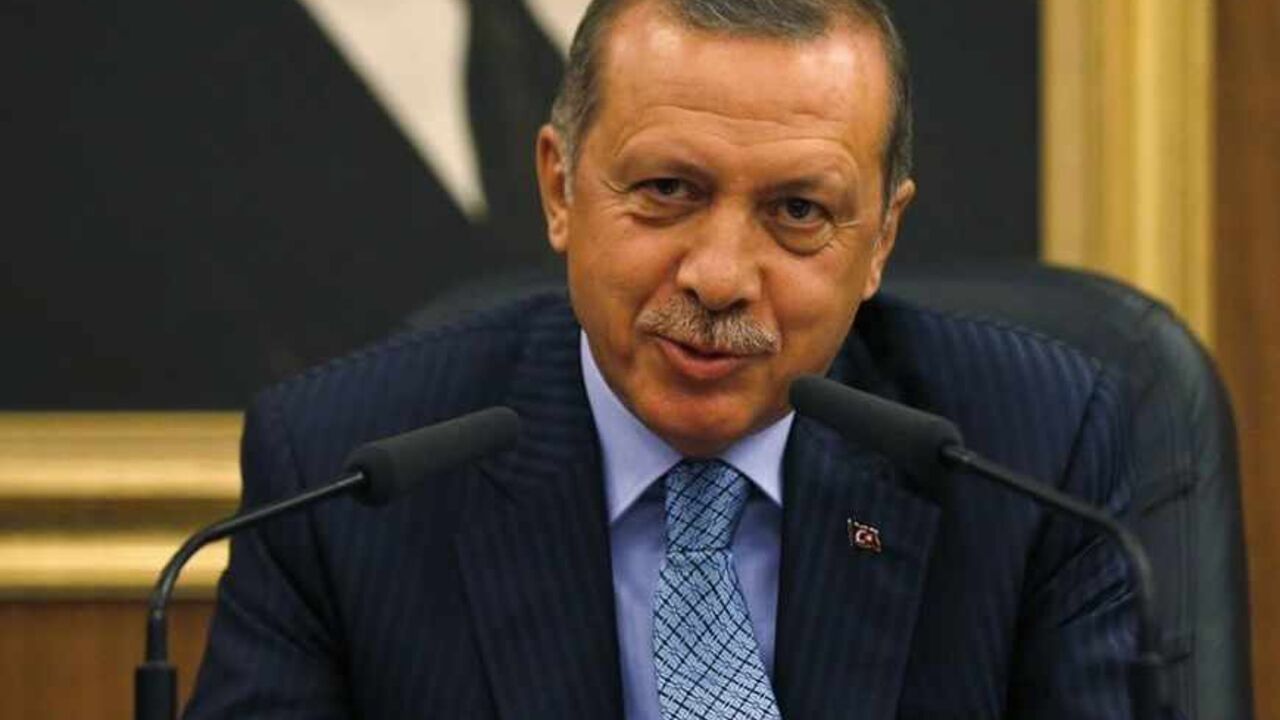 Turkey's Prime Minister Tayyip Erdogan gestures as he addresses the media before leaving for Turkmenistan at Esenboga Airport in Ankara Turkey's Prime Minister Tayyip Erdogan gestures as he addresses the media before leaving for Turkmenistan at Esenboga Airport in Ankara August 15, 2013. Erdogan called on Thursday for the U.N. Security Council to convene quickly and act after what he described as a massacre in Egypt, during a news conference in Ankara. REUTERS/Umit Bektas (TURKEY - Tags: POLITICS) - RTX12M4D
