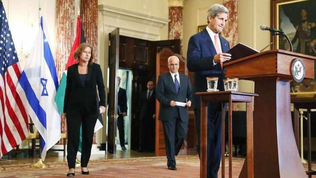 U.S. Secretary of State John Kerry takes the lectern to announce further peace talks at a news conference with Israel's Justice Minister Tzipi Livni and chief Palestinian negotiator Saeb Erekat in Washington U.S. Secretary of State John Kerry (R) takes the lectern to announce further peace talks at a news conference with Israel's Justice Minister Tzipi Livni (L) and chief Palestinian negotiator Saeb Erekat (2nd R) at the State Department in Washington July 30, 2013. Israel and the Palestinians will seek to reach a peace agreement within nine months and negotiators will meet again within two weeks after holding a "positive" first round of talks, Kerry said on Tuesday. REUTERS/Jonathan Ernst (UNITED STATES - Tags