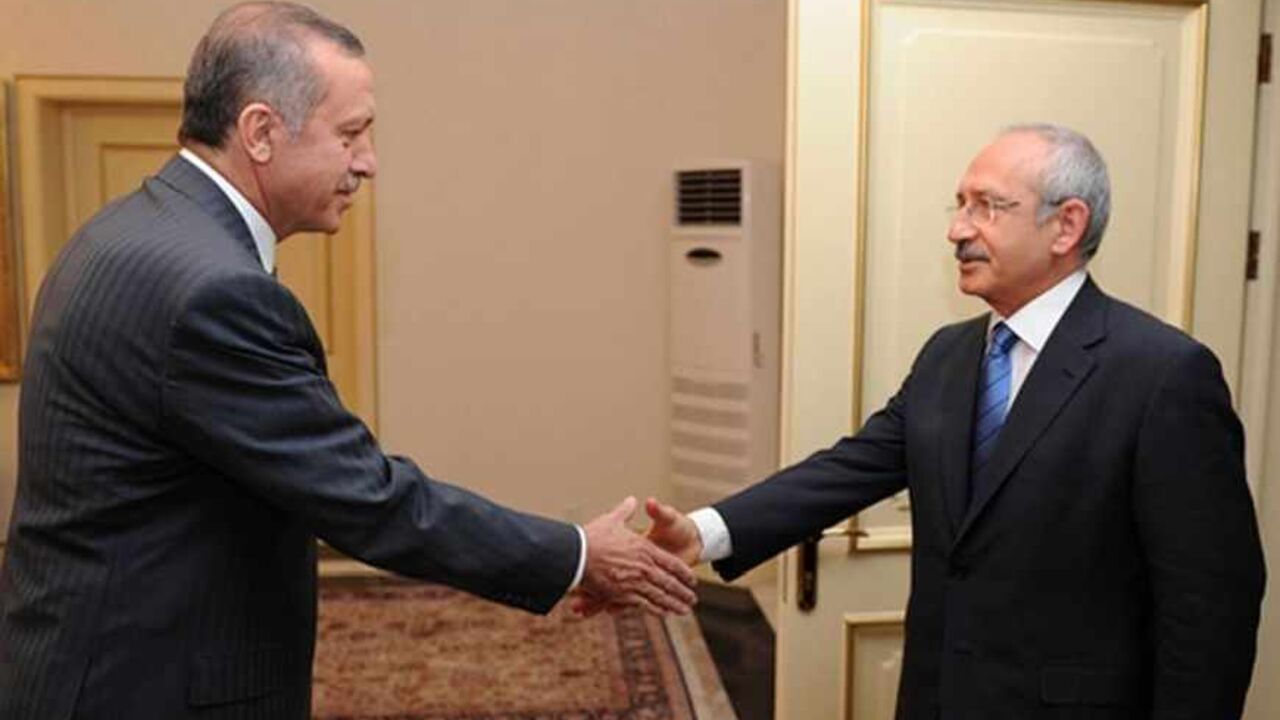 SYRIA-CRISIS/ Turkish Prime Minister Recep Tayyip Erdogan shakes hands with main opposition Republican People's Party (CHP) leader Kemal Kilicdaroglu (R) as they meet in Ankara June 24, 2012. Turkey accused Syria on Sunday of shooting down a military plane in international airspace without warning and called a NATO meeting to discuss a response to Syrian President Bashar al-Assad. Amid growing acrimony between the once-friendly neighbours, Syria said its forces had shot dead "terrorists" infiltrating its territory from T