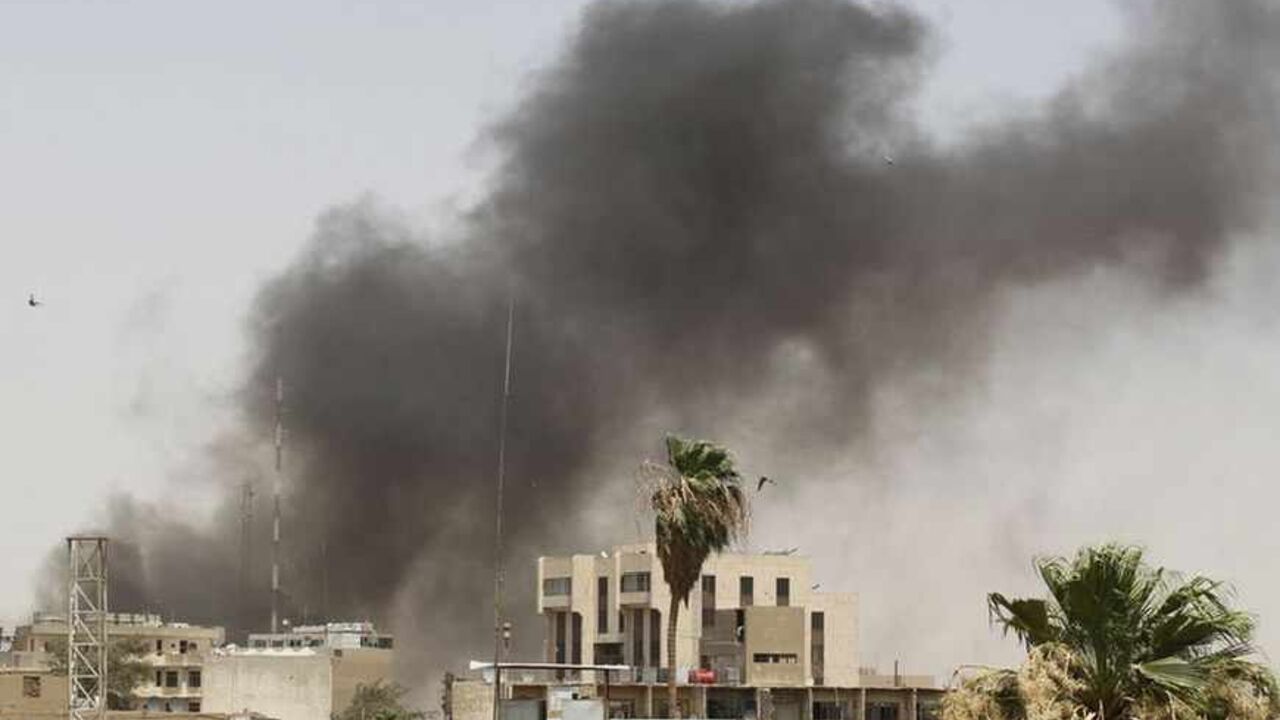 Smoke rises from the site of a bomb attack in Baghdad Smoke rises from the site of a bomb attack in Baghdad July 16, 2011. A parked car bomb targeting a night club killed two people and wounded nine others in central Baghdad, police and hospital sources said. Another police source said only six people were wounded by a roadside bomb. REUTERS/Saad Shalash (IRAQ - Tags: CONFLICT) - RTR2OXMP