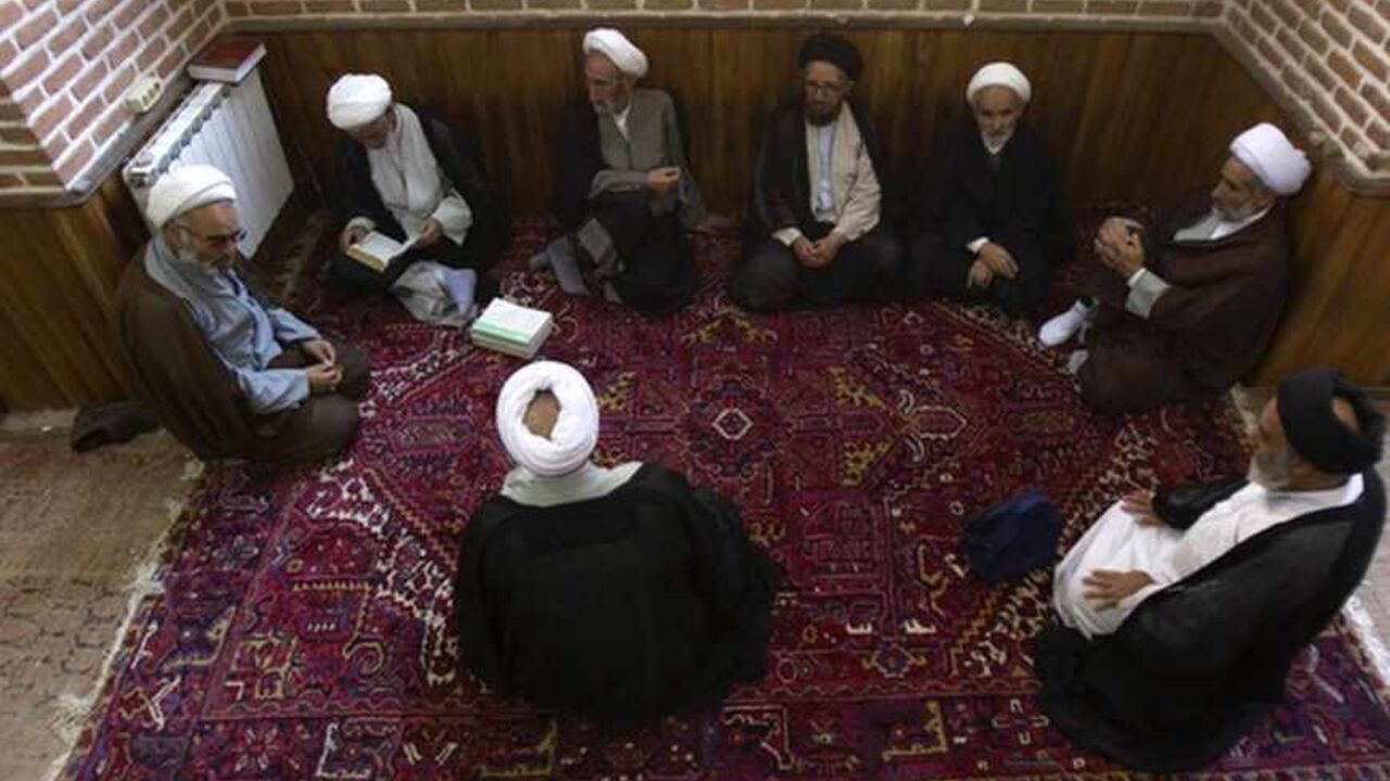 Iranian clergymen debate at Talebiye seminary before noon prayer ceremony in Tabriz historic market EDITORS' NOTE: Reuters and other foreign media are subject to Iranian restrictions on their ability to film or take pictures in Tehran
Iranian clergymen debate at Talebiye seminary before noon prayer ceremony in Tabriz historic market, 633 km (393 miles) northwest of Tehran, early morning August 28, 2011. The Tabriz market was located along the Silk Road trade route and comprised of interlinked structures and spaces for various commercial, religious and educational uses. This market has been registered a