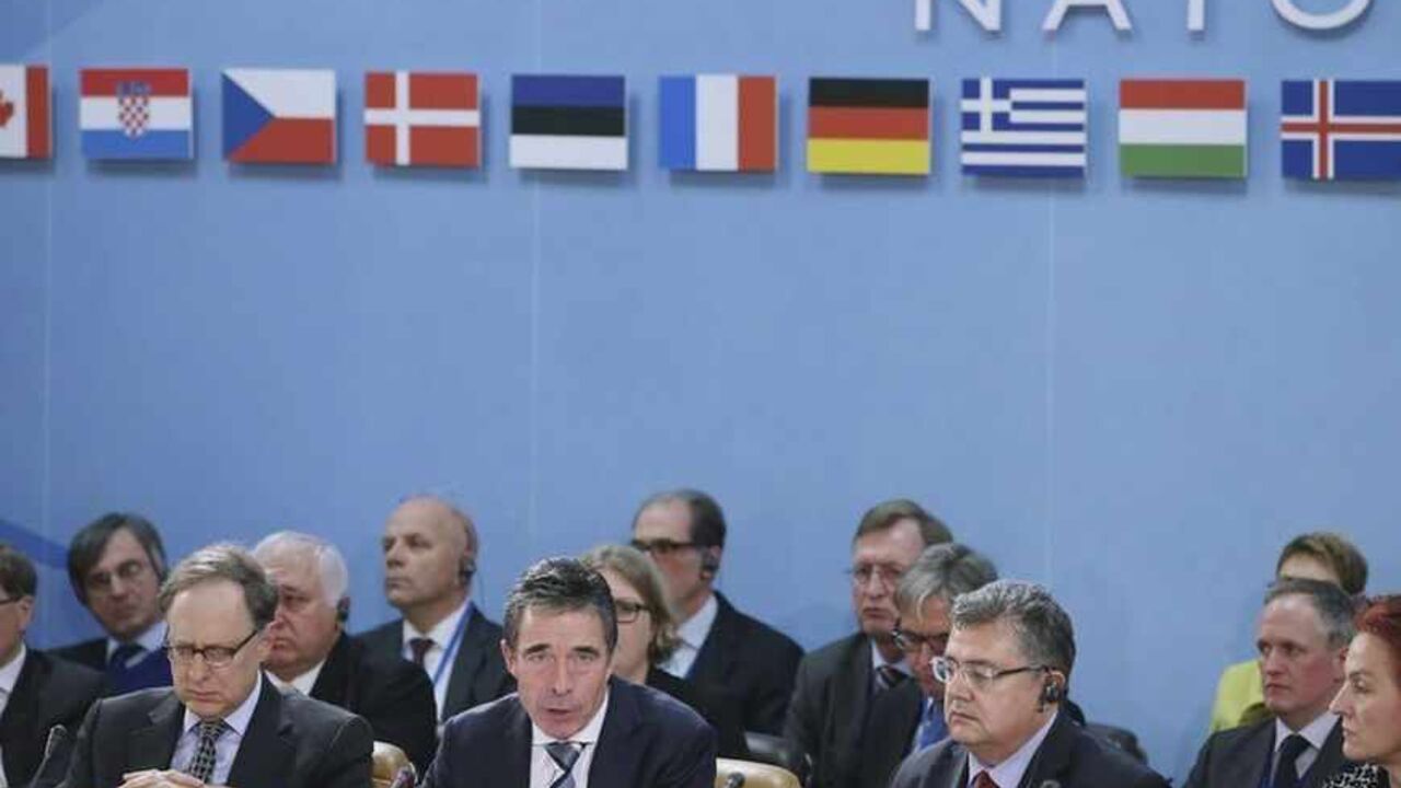 NATO Secretary General Anders Fogh Rasmussen gives the opening remarks during the Defense Ministers' Meeting with Deputy Secretary General Alexander "Sandy" Vershbow at the NATO headquarters in Brussels North Atlantic Treaty Organization (NATO) Secretary General Anders Fogh Rasmussen (2nd L) gives the opening remarks during the Defense Ministers' Meeting with Deputy Secretary General Alexander "Sandy" Vershbow (L) at the NATO headquarters in Brussels, February 21, 2013. U.S. Secretary of Defense Leon Panetta is attending the NATO meetings and holding bilateral meetings with other defense officials. REUTERS/Chip Somodevilla/Pool (BELGIUM - Tags: MILITARY POLITICS) - RTR3E2RV