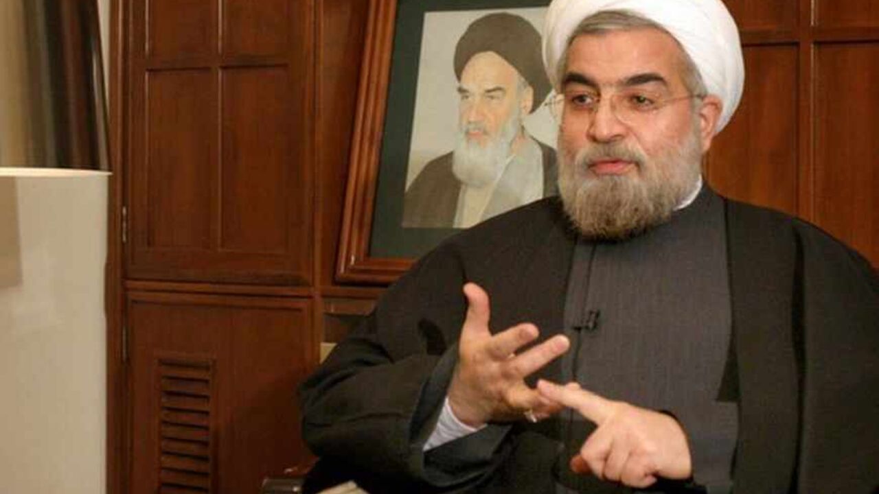 Iran's chief nuclear negotiator Rohani speaks with Reuters correspondent in Tehran. Iran's chief nuclear negotiator Hassan Rohani speaks with a Reuters correspondent during a private interview in Tehran February 6, 2005. REUTERS/Raheb Homavandi RH/CJF/AA - RTRMHK5