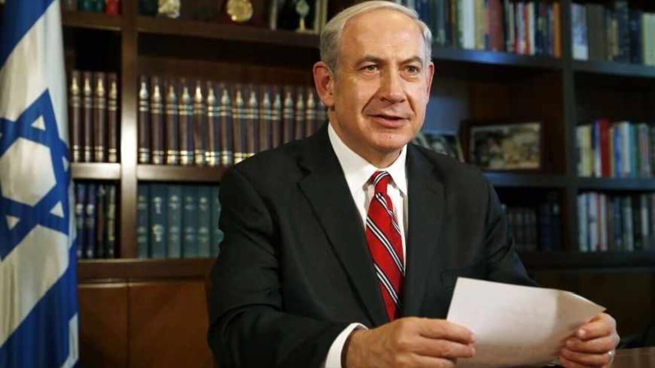 ISRAEL-NETANYAHU/ Israeli Prime Minister Benjamin Netanyahu smiles at the start of an interview with Reuters in Jerusalem June 17, 2013. Iran's election has exposed popular discontent with the Tehran government but was unlikely to bring about any change in Iranian nuclear policy, Netanyahu told Reuters on Monday. REUTERS/Darren Whiteside (JERUSALEM - Tags: POLITICS HEADSHOT) - RTX10R1G
