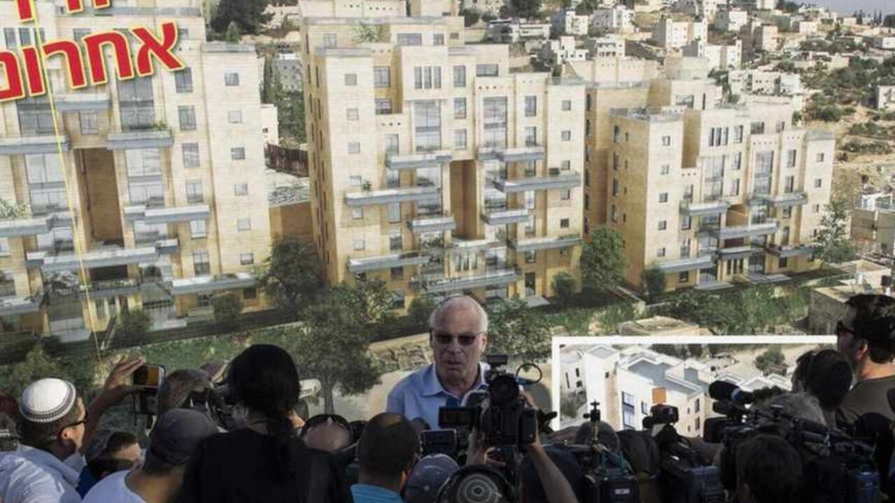 Israeli Housing Minister Ariel speaks to reporters at a ceremony announcing the resumption of construction of an Israeli neighbourhood in East Jerusalem Israeli Housing Minister Uri Ariel speaks to reporters at a ceremony announcing the resumption of construction of an Israeli neighbourhood in East Jerusalem August 11, 2013. Israel moved forward on Sunday with plans to build nearly 1,200 new homes for Jewish settlers holding fast to a defiant settlement policy just days before its expected release of Palestinian prisoners. REUTERS/Ronen Zvulun (JERUSALEM - Tags: POLITICS) - RTX12HFR