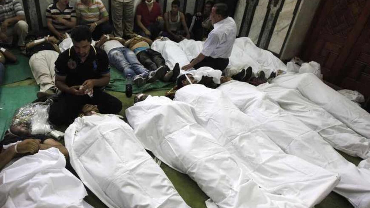 Bodies of protesters who support ousted Egyptian President Mohamed Mursi killed during clashes are seen inside a mosque on Ramses Square in Cairo ATTENTION EDITORS - VISUAL COVERAGE OF SCENES OF INJURY OR DEATH
Bodies of protesters who support ousted Egyptian President Mohamed Mursi, killed during clashes, are seen inside a mosque in Ramses Square in Cairo, August 16, 2013. Protests by supporters of ousted Islamist President Mohamed Mursi turned violent across Egypt on Friday, with witnesses reporting four dead in central Cairo and at least 12 killed in northern cities as the Muslim Brotherhood staged a "Day of Rage". REUTERS/Mohamed Abd El Ghany (E