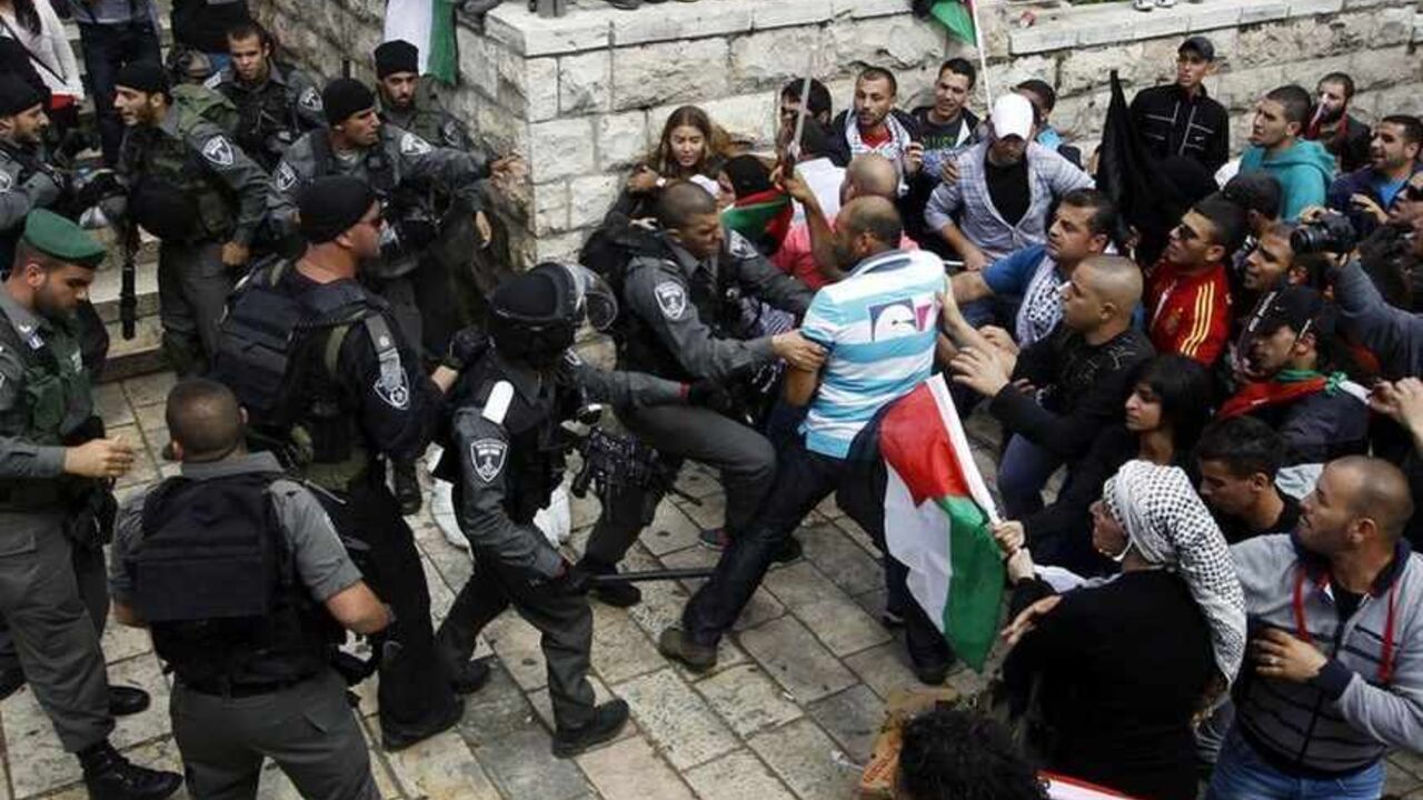 Palestinian protestors clash with Israeli security forces during clashes near Damascus Gate at Jerusalem's old city Palestinian protestors clash with Israeli security forces during clashes near Damascus Gate at Jerusalem's old city May 15, 2013. Palestinians clashed with Israeli forces in the occupied West Bank and at East Jerusalem on Wednesday during demonstrations to mark 65 years since what they call the Nakba (Catastrophe) when Israel's creation caused many to lose their homes and become refugees. REUTERS/Ammar Awad (JERUSALEM - Tags: POLITICS CIVIL UNREST CRIME LAW ANNIVERSARY TPX IMAGES OF THE DAY) - RTXZNBX