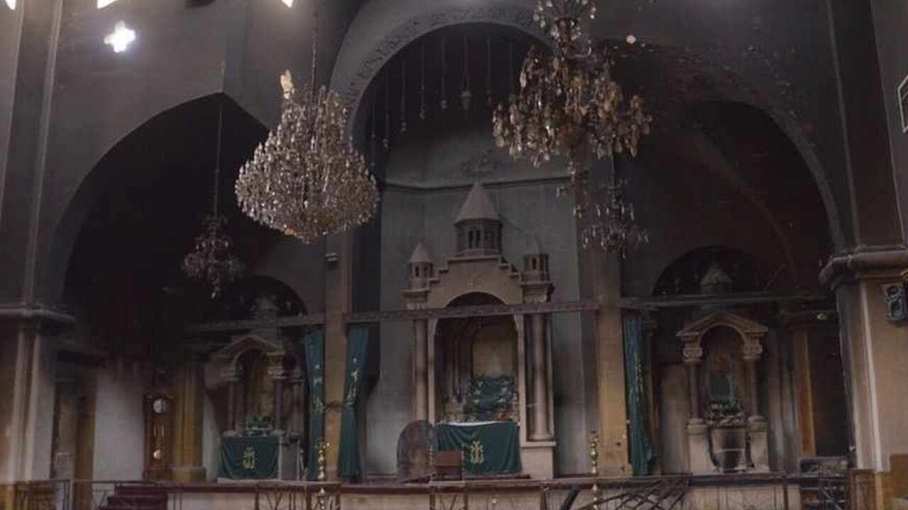 The burnt interior of Kevork Church is pictured after clashes between Free Syrian Army fighters and forces loyal to Syria's President Bashar al-Assad, at the al-Midan area in Aleppo The burnt interior of Kevork Church is pictured after clashes between Free Syrian Army fighters and forces loyal to Syria's President Bashar al-Assad, at the al-Midan area in Aleppo October 30, 2012. REUTERS/George Ourfalian (SYRIA - Tags: CONFLICT CIVIL UNREST POLITICS) - RTR39RY3