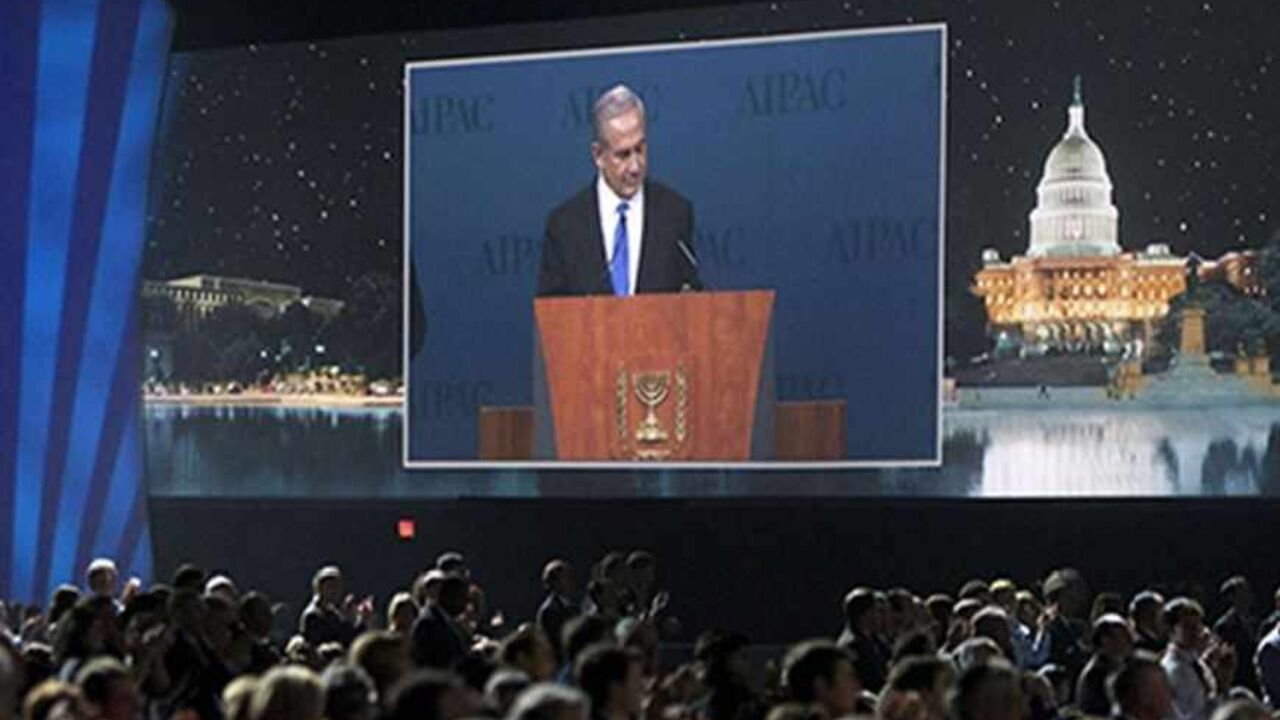 Israeli Prime Minister Benjamin Netanyahu is seen on a screen as he speaks at the American Israel Public Affairs Committee (AIPAC) policy conference in Washington March 5, 2012.      REUTERS/Joshua Roberts    (UNITED STATES - Tags: POLITICS) - RTR2YWD1