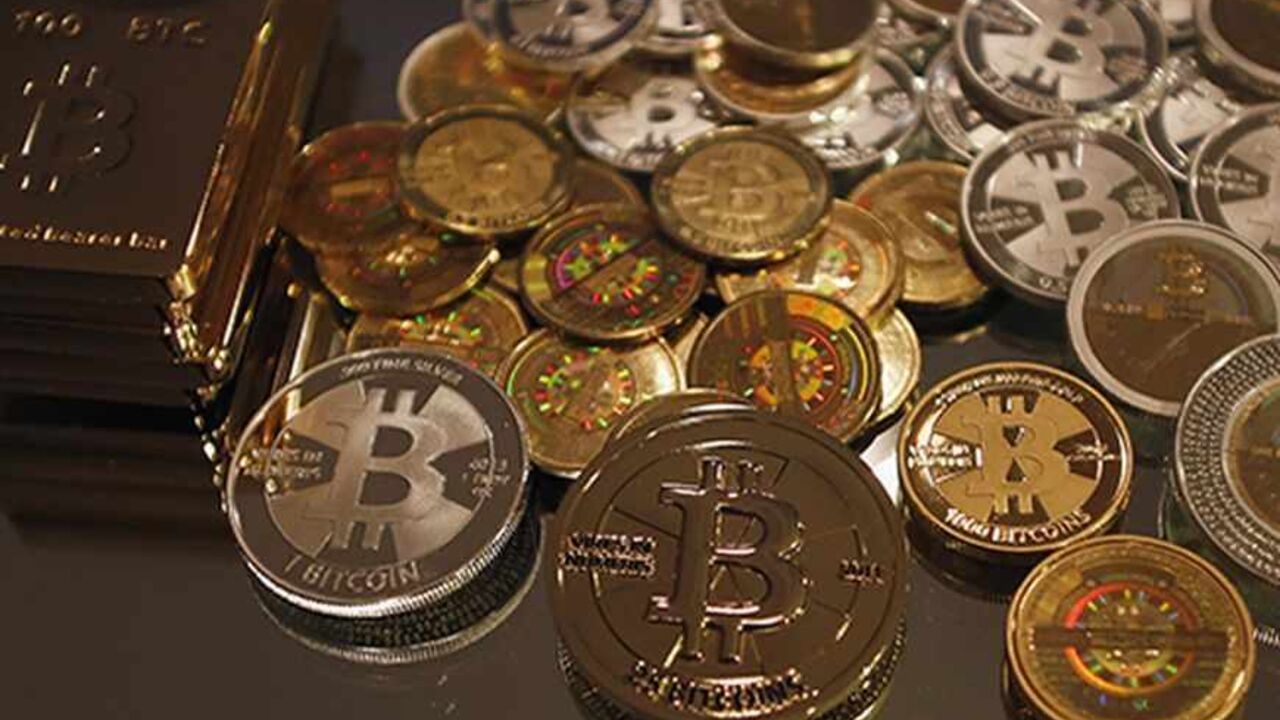 Some of Bitcoin enthusiast Mike Caldwell's coins are pictured at his office in Sandy, Utah, September 17, 2013.Caldwell produces physical coins Bitcoins, which have been around since 2008, and have become a form of electronic money that can be exchanged without using traditional banking or money transfer systems. Bitcoins, touted by some experts as the future of money, gained in prominence during Europe's financial crisis as more people questioned the safety of holding their cash in the bank. REUTERS/Jim Ur