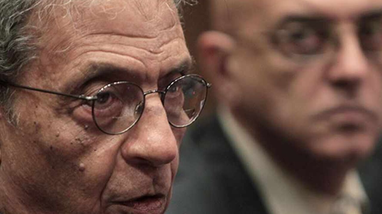 EGYPT/ Amr Moussa (L), chairman of the committee to amend the country's constitution speaks at a news conference, next to media spokesperson Mohamed Salmawy, at the Shura Council in Cairo September 22, 2013. Moussa has been selected to chair the committee entrusted with amending the constitution pushed through by deposed Islamist president Mohamed Mursi. REUTERS/Mohamed Abd El Ghany (EGYPT - Tags: POLITICS) - RTX13UNS