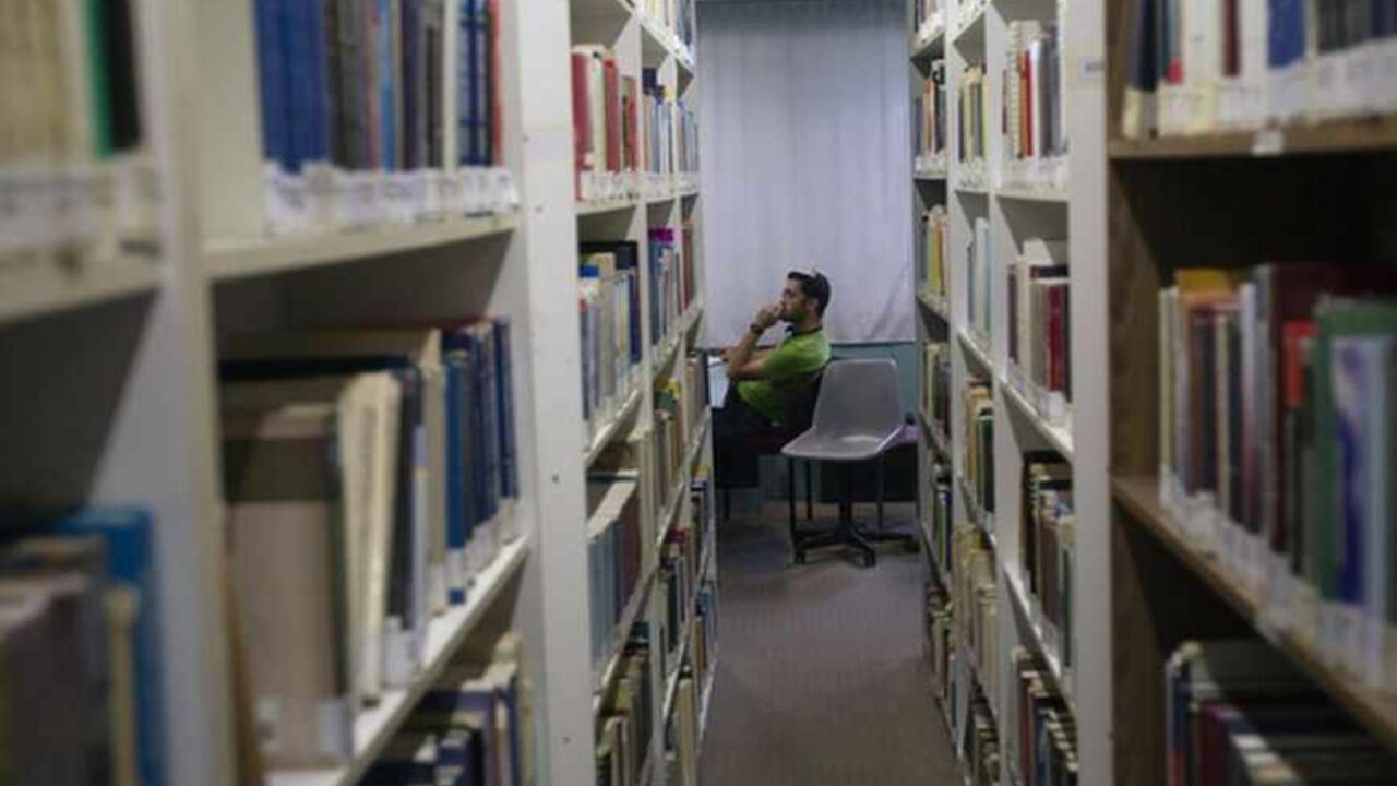 A student sits in a library at the Ariel University Centre in the West Bank Jewish settlement of Ariel A student sits in a library at the Ariel University Centre in the West Bank Jewish settlement of Ariel September 13, 2012. An Israeli government move to upgrade Ariel University Centre in the occupied West Bank to a full-fledged university has put the 30-year-old school at the centre of a debate at the core of the Israeli-Palestinian conflict: how the settlements will figure in defining a future Palestinian state. Picture taken September 13, 2012. To match Feature PALESTINIANS-ISRAEL/SETTLEMENTS REUTERS