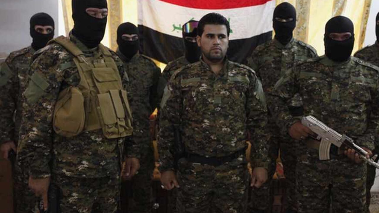 Fighters from Iraq's Islamist Shi'ite militias pose for pictures before departing to Syria from Baghdad Fighters from Iraq's Islamist Shi'ite militias pose for pictures before departing to Syria from Baghdad, June 11, 2013. Syria is splintering the Middle East along a divide between the two main denominations of Islam, becoming a battlefield in a proxy war between Assad's main regional ally, Shi'ite Iran, and his Sunni enemies in Turkey and the Gulf Arab states. As the Syrian war grinds into its third year, sectarian killings are increasing, while hardline Sunni clerics are declaring Jihad or holy war on the