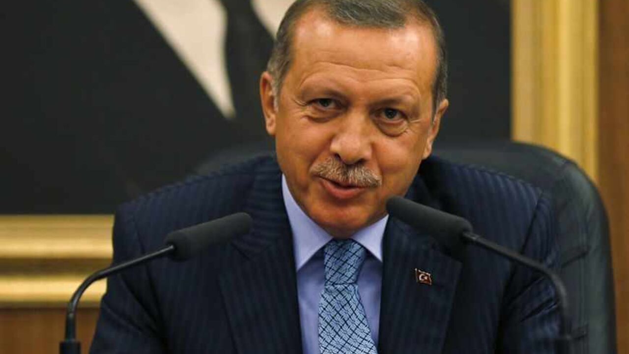 Turkey's Prime Minister Tayyip Erdogan gestures as he addresses the media before leaving for Turkmenistan at Esenboga Airport in Ankara Turkey's Prime Minister Tayyip Erdogan gestures as he addresses the media before leaving for Turkmenistan at Esenboga Airport in Ankara August 15, 2013. Erdogan called on Thursday for the U.N. Security Council to convene quickly and act after what he described as a massacre in Egypt, during a news conference in Ankara. REUTERS/Umit Bektas (TURKEY - Tags: POLITICS) - RTX12M4D