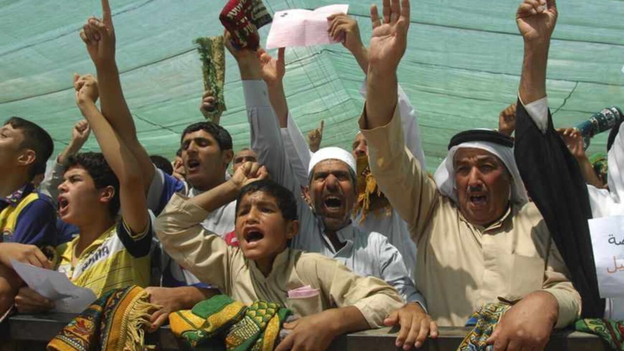 Iraqi Sunni Muslims chant "Allahu Akbar", meaning God is great, during an anti-government demonstration in the central city of Samarra Iraqi Sunni Muslims chant "Allahu Akbar", meaning God is great, during an anti-government demonstration in the central city of Samarra, May 17, 2013. Tens of thousands of Sunni Muslims poured onto the streets of Ramadi and Falluja in the western province of Anbar following Friday prayers, in their biggest show of strength since the outbreak of protests last year. REUTERS/Bakr al-Azzawi (IRAQ - Tags - Tags: RELIGION POLITICS) - RTXZQH6