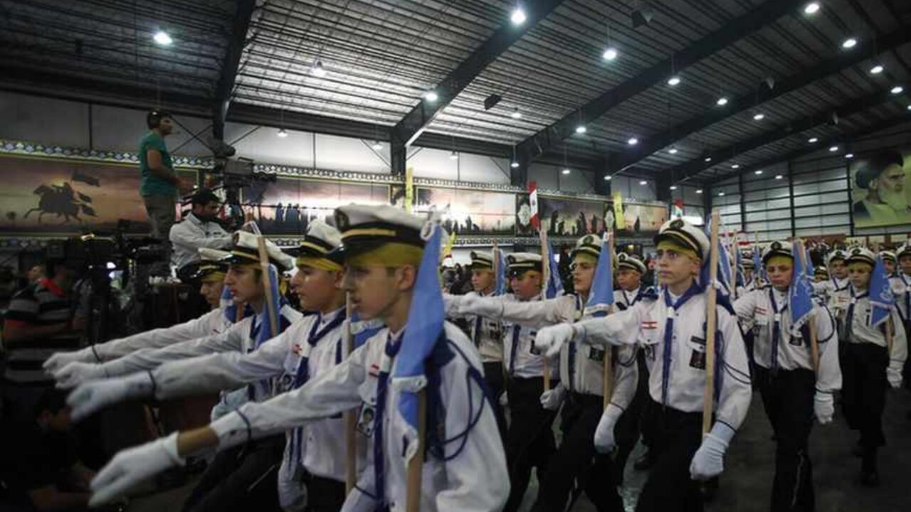 Lebanon's Hezbollah scouts parade during a rally to mark 'Quds (Jerusalem) Day' in Beirut's southern suburbs Lebanon's Hezbollah scouts parade during a rally to mark 'Quds (Jerusalem) Day' in Beirut's southern suburbs, August 2, 2013. Hezbollah leader Sayyed Hassan Nasrallah delivered a speech to hundreds of supporters in support of Palestinians in his first public appearance since last September. He has been living in hiding, for fear of assassination, since Hezbollah fought a month-long war with Israel in 2006. REUTERS/Sharif Karim (LEBANON - Tags: POLITICS CIVIL UNREST ANNIVERSARY) - RTX128J7