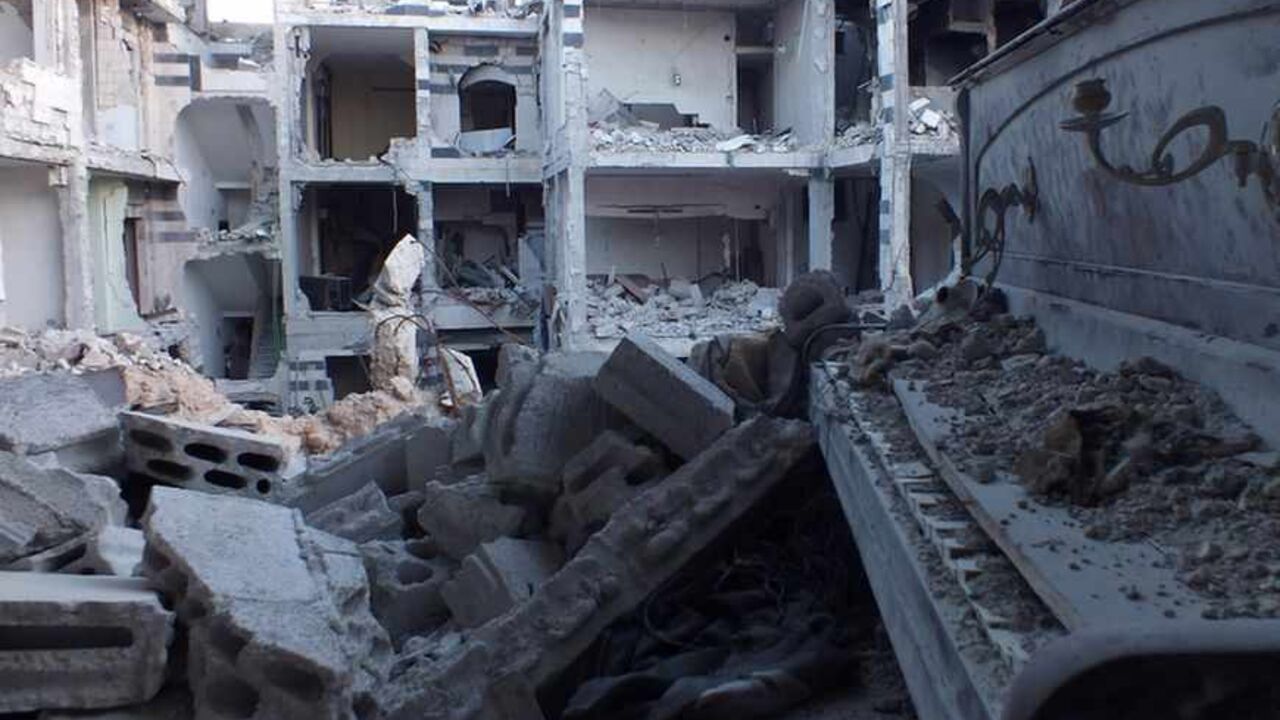 A general view shows a damaged piano amid destroyed buildings in the besieged area of Homs A general view shows a damaged piano amid buildings destroyed by what activists said was shelling by forces loyal to Syria's President Bashar al-Assad in the besieged area of Homs September 2, 2013. REUTERS/Yazan Homsy (SYRIA - Tags: POLITICS CIVIL UNREST) - RTX1351E