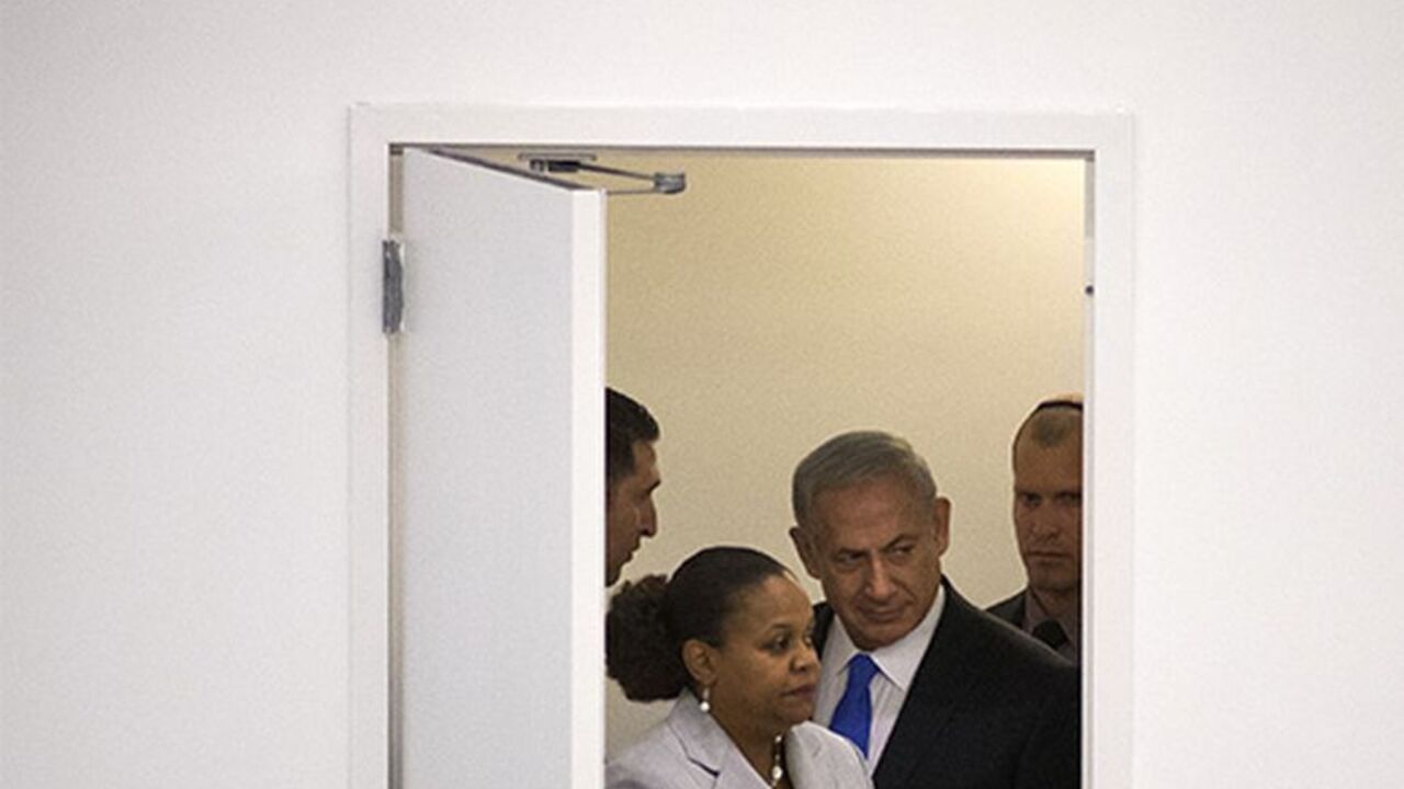 UN-ASSEMBLY/ISRAEL Israel's Prime Minister Benjamin Netanyahu enters a door to speak at the 68th session of the United Nations General Assembly in New York October 1, 2013. Netanyahu said on Tuesday the only way to peacefully stop Iran from developing nuclear weapons is to combine tough sanctions with a credible military threat and that Israel was ready to stand alone in defending itself. REUTERS/Adrees Latif (UNITED STATES - Tags: POLITICS) - RTR3FHFO