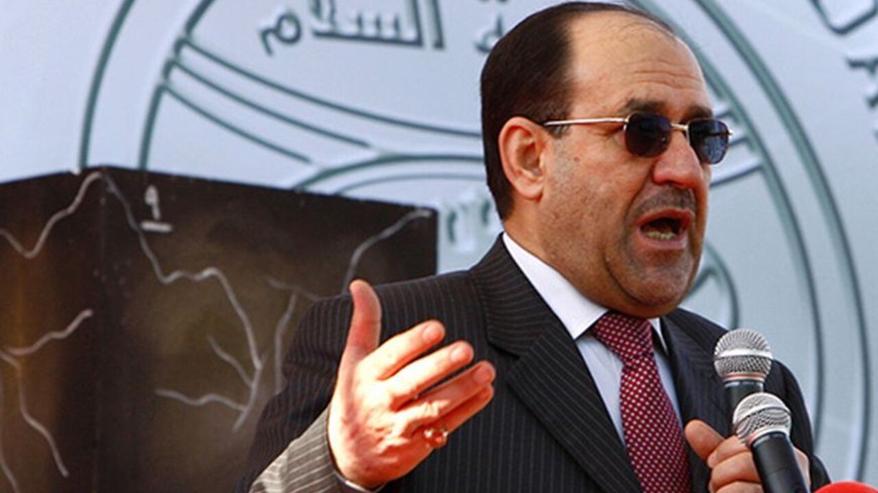 IRAQ/ Iraq's Prime Minister Nuri al-Maliki speaks during Baghdad Day celebrations at al-Zawra park in Baghdad November 15, 2008. REUTERS/Mahmoud Raouf Mahmoud (IRAQ) - RTXAMED