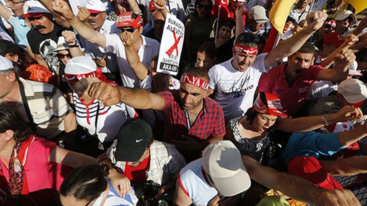 TURKEY-PROTESTS/EU Anti-government Alevi protesters shout slogans during a demonstration in Istanbul June 23, 2013. The European Union is on the verge of scrapping a new round of membership talks with Turkey, a move that would further undermine Ankara's already slim hopes of joining the bloc and damage its relations with Brussels. Germany, the EU's biggest economic power, is blocking efforts to revive Turkey's EU membership bid, partly because of its handling of anti-government protests that have swept the country in the last
