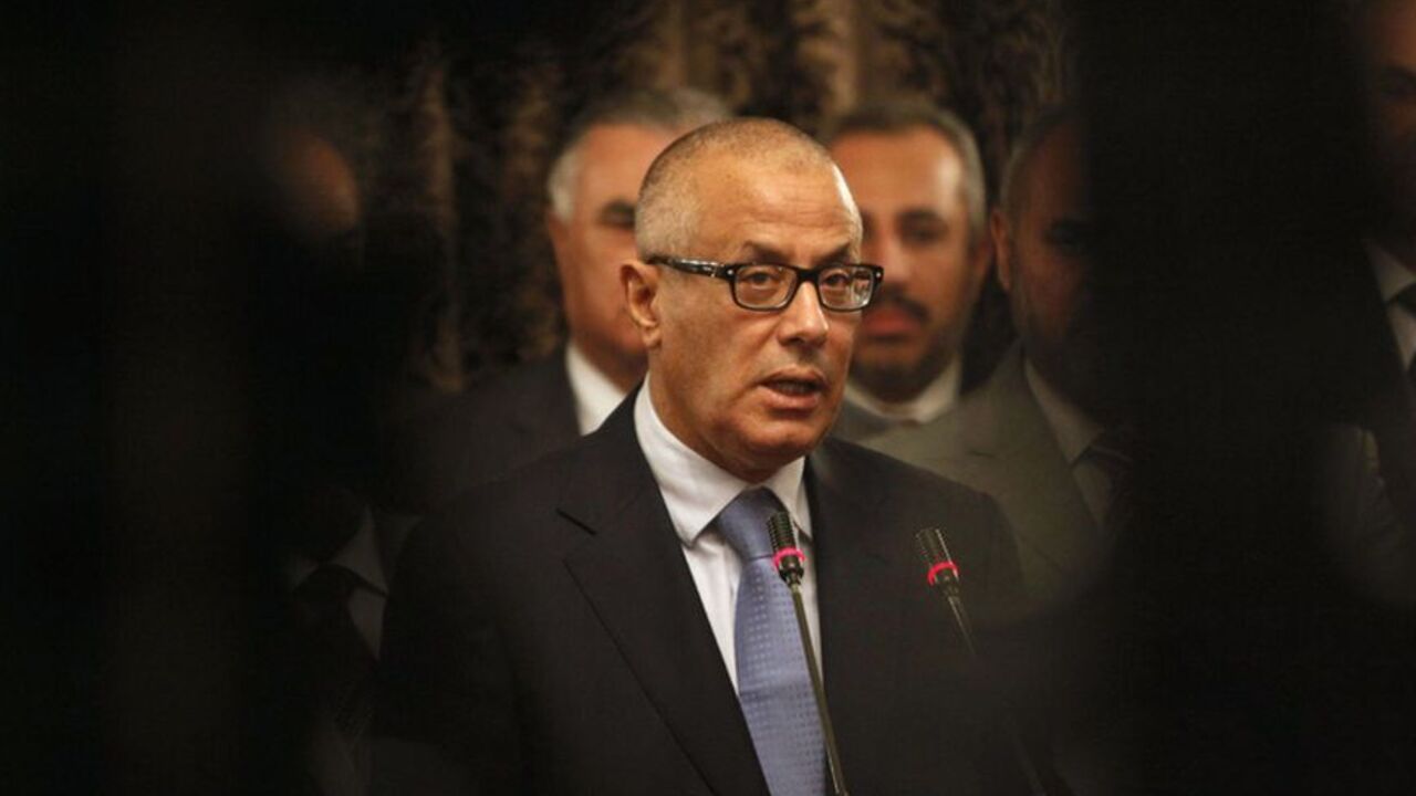 Libya's PM Ali Zeidan speaks during a news conference in Tripoli Libya's Prime Minister Ali Zeidan speaks during a news conference at the headquarters of the prime minister's office in Tripoli October 11, 2013. Zeidan said on Friday former rebels who abducted him briefly were part of an attempted "coup" by his opponents in the country's legislature, accusing them of seeking to undermine his government. REUTERS/Ismail Zitouny (LIBYA - Tags: POLITICS CIVIL UNREST) - RTX147NX