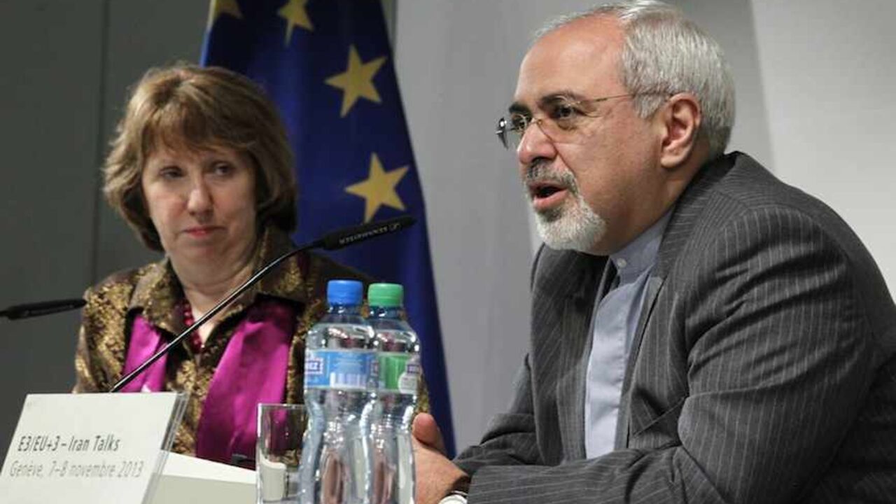 European Union foreign policy chief Ashton listens as Iranian Foreign Minister Zarif speaks during a news conference in Geneva European Union foreign policy chief Catherine Ashton listens as Iranian Foreign Minister Mohammad Javad Zarif (R) speaks during a news conference at the end of the Iranian nuclear talks in Geneva November 10, 2013. Zarif and Ashton said on Sunday they hoped Iran and six world powers would reach an agreement when they gather again in 10 days, adding that the latest round of talks on Tehran's nuclear programme was something all delegations can build on. REUTERS/Jason Reed (SWITZERLAND - Tags: POLITICS) - R