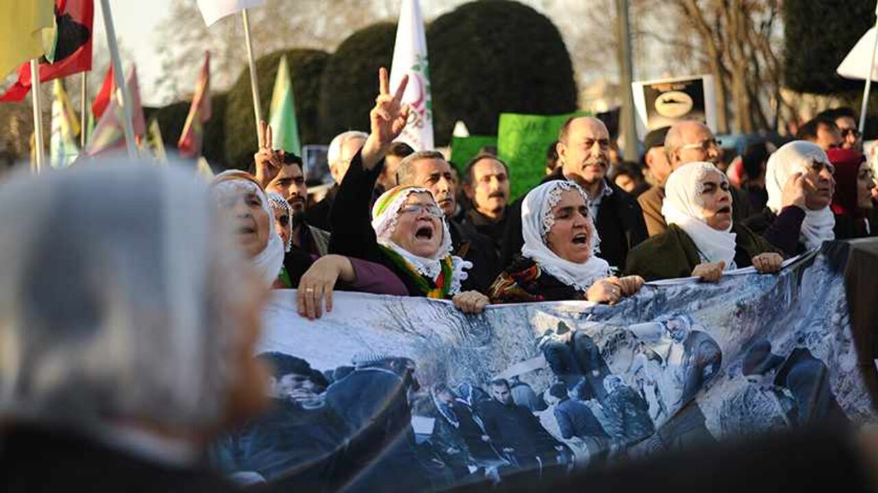 Par7752611 Kurdish people chant slogans during a march on December 28, 2013 in Istanbul marking the second anniversary of the December 28, 2011 killing of 34 Turkish-Kurdish civilians working as smugglers at the Turkey-Iraq border in a botched raid by Turkish military jets, known as the Roboski strike, that mistook the group for Kurdistan Workers' Party (PKK) militants. AFP PHOTO / OZAN KOSE (Photo credit should read OZAN KOSE/AFP/Getty Images)