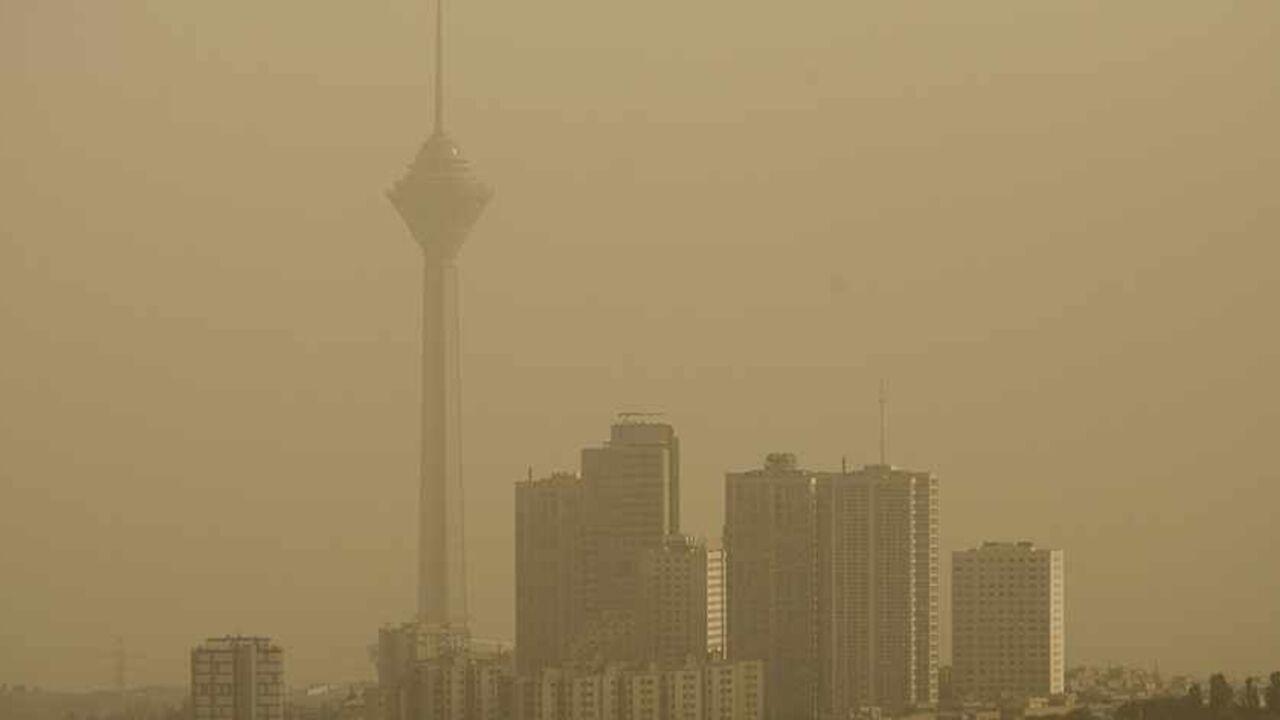 IRAN/ EDITORS' NOTE: Reuters and other foreign media are subject to Iranian restrictions on their ability to film or take pictures in Tehran.
A general view shows Tehran's Milad telecommunication tower (L) as the city is covered in dust July 6, 2009. The government closed private educational centres, state offices, industrial units and military bases for two days and raised its pollution alert status due to the dust, which an official from Tehran's environment office attributed the source to dust from dried marsh