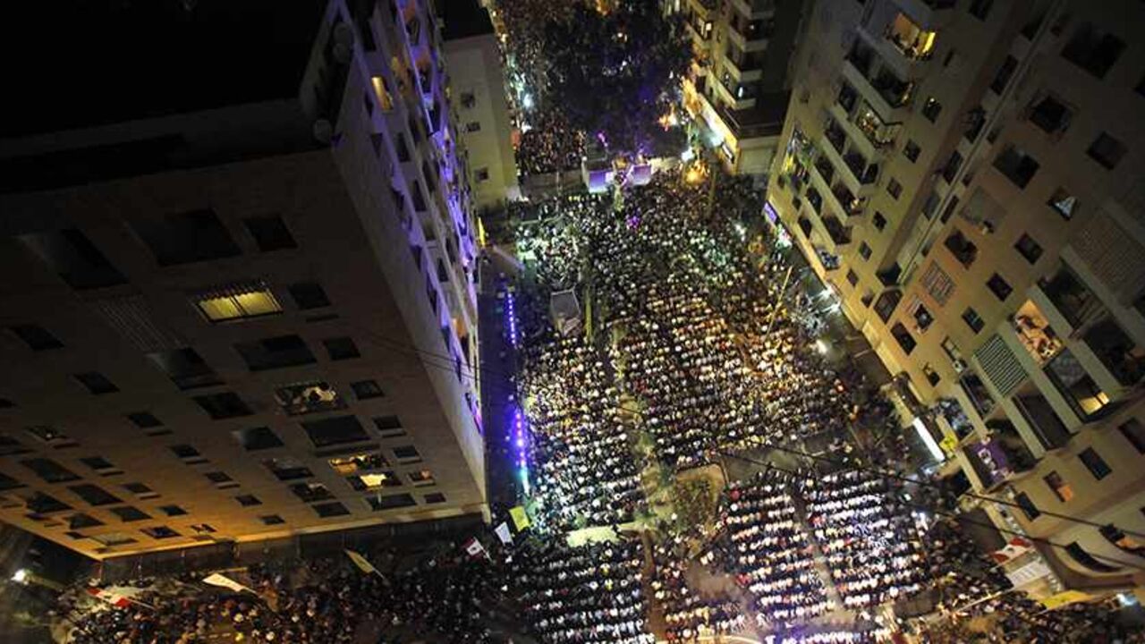 HEZBOLLAH-ISRAEL/ A general view shows Lebanon's Hezbollah supporters attending a ceremony in Beirut's southern suburbs, May 11, 2012. The ceremony was held to mark the completion of the Waed (promise) project for rebuilding Beirut's southern suburbs, which were destroyed during the July 2006 war with Israel. Hezbollah's leader Sayyed Hassan Nasrallah said during the ceremony his militant group was capable of striking any target in neighbouring Israel, saying "the days when we fled and they didn't are over". REUTERS/Sharif K