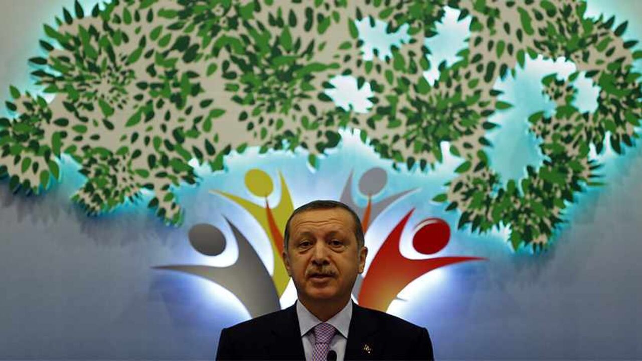 TURKEY/ Turkey's Prime Minister Tayyip Erdogan delivers his speech during an international conference on the Arab awakening and peace in the Middle East in Istanbul September 7, 2012. REUTERS/Murad Sezer (TURKEY - Tags: POLITICS RELIGION) - RTR37O1J