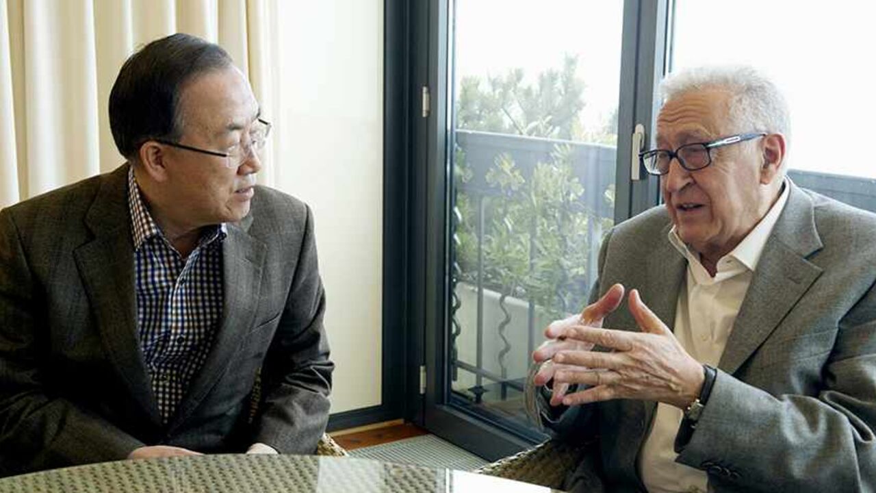 SYRIA-CRISIS/UN United Nations chief Ban Ki-moon (L) and Syria mediator Lakhdar Brahimi speak during a meeting in Mont Pelerin March 2, 2013. Ban and Syria mediator Brahimi expressed frustration on Saturday at the failure to end Syria's conflict and said the United Nations was ready to facilitate peace talks. Ban and Brahimi met in Mt. Pelerin, Switzerland, to discuss the two-year-old war that has killed more than 70,000 people. REUTERS/U.N. Photo/Evan Schneider/Handout (SWITZERLAND - Tags: POLITICS MILITARY) ATTENTION EDI