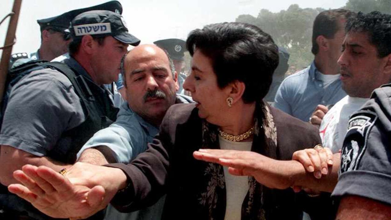 MIDEAST Prominent Palestinian human rights advocate hanan Ashrawi is protected by a Palestinians who tries to keep Israeli riot police from pushing her during scuffles which broke out May 27 at the Ras Al-Amud settlement complex under construction in Arab East Jerusalem. Israeli police say they had to use force to prevent the Palestinian demonstrators from pushing their way into the construction site during a demonstration against the continuing building restarted after months of suspension.
JWH/GB - RTRPJGB