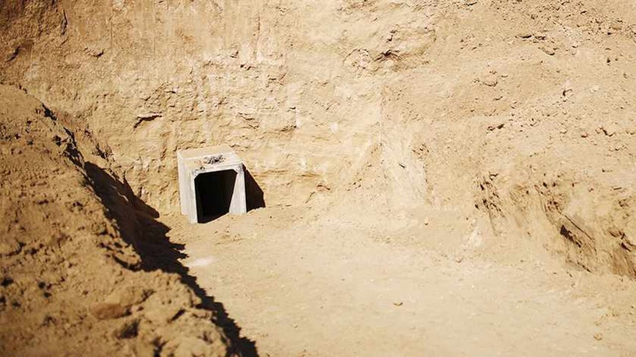 PALESTINIANS-ISRAEL/TUNNEL An entrance to a tunnel exposed by the Israeli military is seen near Kibbutz Ein Hashlosha, just outside the southern Gaza Strip October 13, 2013. Israel displayed on Sunday what it called a Palestinian "terror tunnel" running into its territory from the Gaza Strip and said it was subsequently freezing the transfer of building material to the enclave. REUTERS/Amir Cohen (ISRAEL - Tags: POLITICS CIVIL UNREST MILITARY) - RTX149RZ