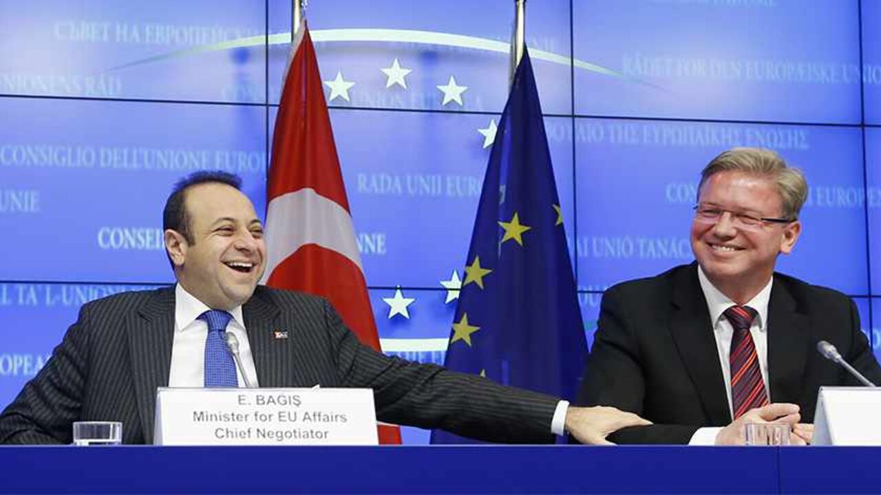 EU-TURKEY/ Turkey's European Affairs Minister Egemen Bagis addresses a joint news conference with European Enlargement Commissioner Stefan Fule (R) after EU-Turkey accession talks in Brussels November 5, 2013. REUTERS/Francois Lenoir (BELGIUM - Tags: POLITICS) - RTX150NB
