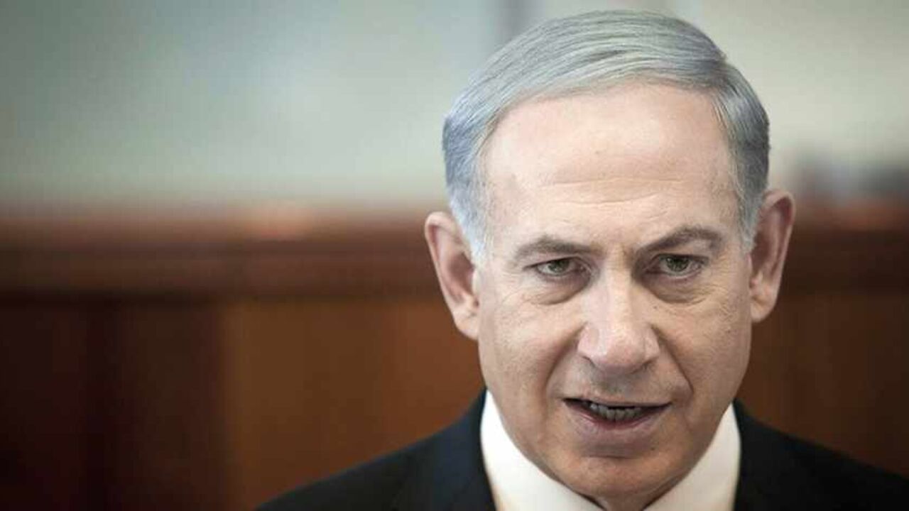 Israel's Prime Minister Benjamin Netanyahu attends the weekly cabinet meeting in Jerusalem November 17, 2013. U.S. Secretary of State John Kerry will travel to Israel on Friday to discuss a proposed deal between world powers and Iran on the Islamic Republic's nuclear programme, Netanyahu said on Sunday. REUTERS/Dan Balilty/Pool (JERUSALEM - Tags: POLITICS HEADSHOT) - RTX15GVA