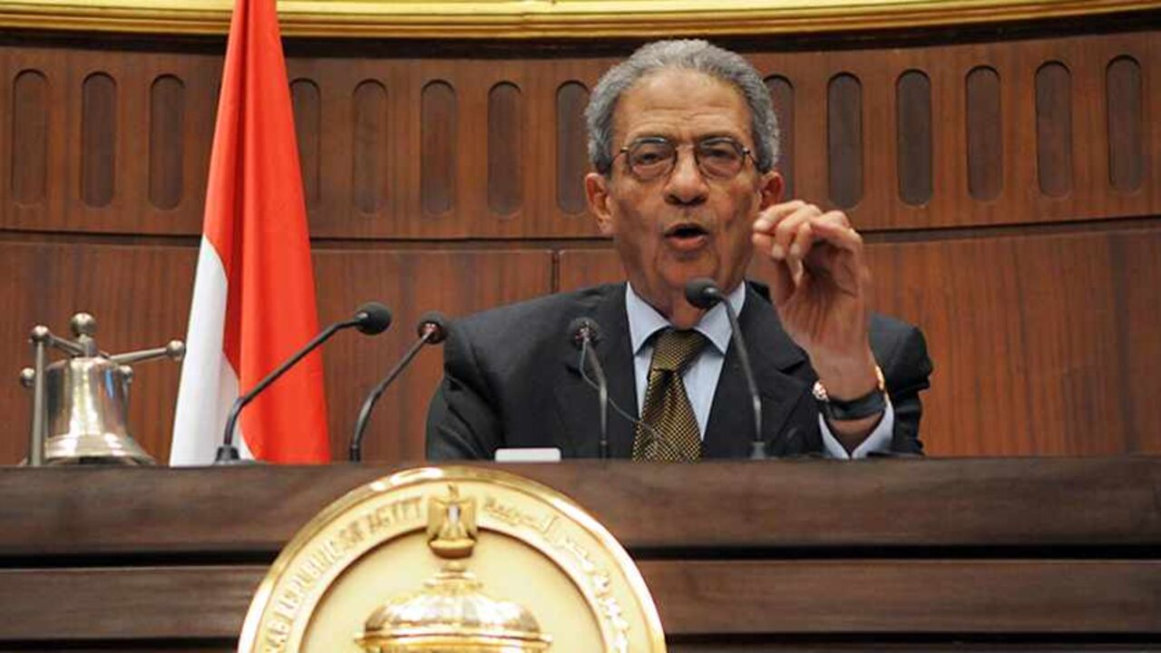 EGYPT-POLITICS/ Amr Moussa, head of the assembly writing Egypt's new constitution,speaks after they finished their vote at the Shura Council in Cairo December 1, 2013. A hardline Islamist leader said the army had driven Egypt to the "edge of a precipice", as a new constitution likely to ban Islamic political parties was set to be approved on Sunday by the panel that drafted it. The 50-member constituent assembly was due to finish voting on a draft that reflects how the balance of power has shifted in Egypt since secular-mi