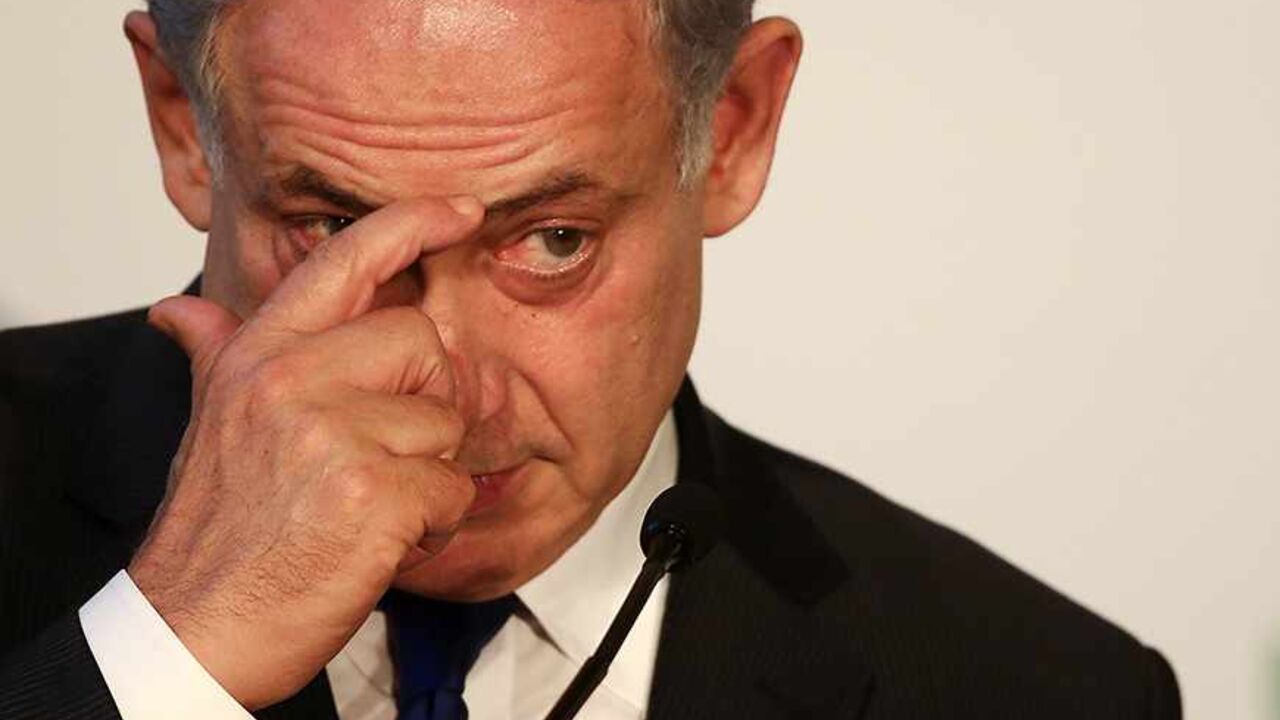 ITALY Israeli Prime Minister Benjamin Netanyahu listens to a question during a joint news conference with his Italian counterpart Enrico Letta at the end of a bilateral meeting at Villa Madama in Rome December 2, 2013. REUTERS/Alessandro Bianchi (ITALY - Tags: POLITICS) - RTX1616K