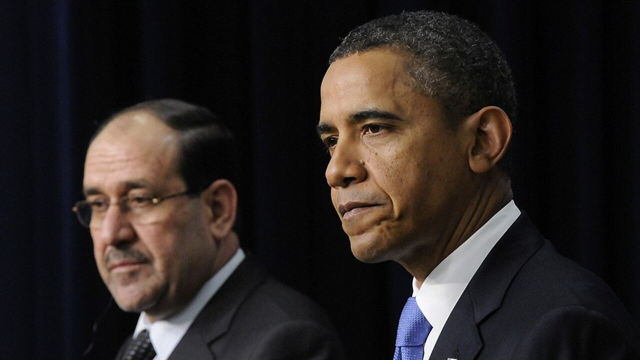 IRAQ-USA/ Iraq's Prime Minister Nuri al-Maliki (L) and U.S. President Barack Obama (R) listen to questions during a joint news conference in the Eisenhower Executive Office Building on the White House campus in Washington, December 12, 2011. REUTERS
Jonathan Ernst (UNITED STATES - Tags: POLITICS) - RTR2V679