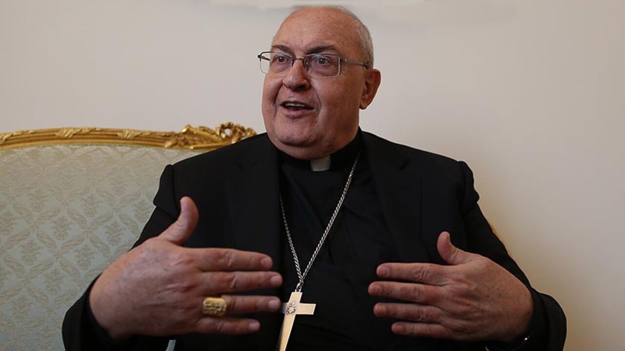 POPE-SUCCESSION/ Cardinal Leonardo Sandri gestures during an interview with Reuters in Rome, March 2, 2013. In an exclusive interview with Reuters, Cardinal Leonardo Sandri, 69, an Argentine, said the next pope should not be chosen according to a geographic area but must be a "saintly man" who is "best qualified" to lead the Church in a time of crisis. Picture taken March 2, 2013. REUTERS/Tony Gentile (ITALY - Tags: RELIGION) - RTR3EIJ3
