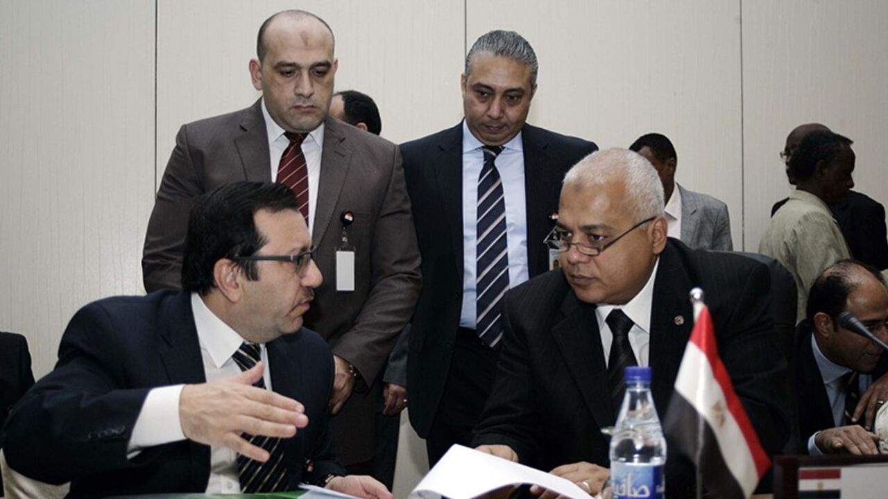 Nic6281461 Egyptian Water Minister Mohamed Abdul Muttalib listens to a member of his delegation during tripartite talks about Ethiopia's Great Renaissance Dam on January 4, 2014 in the Sudanese capital, Khartoum. The talks are being attended by the irrigation ministers of Ethiopia, Egypt and Sudan and are set to last for three days. AFP PHOTO EBRAHIM HAMID (Photo credit should read EBRAHIM HAMID/AFP/Getty Images)