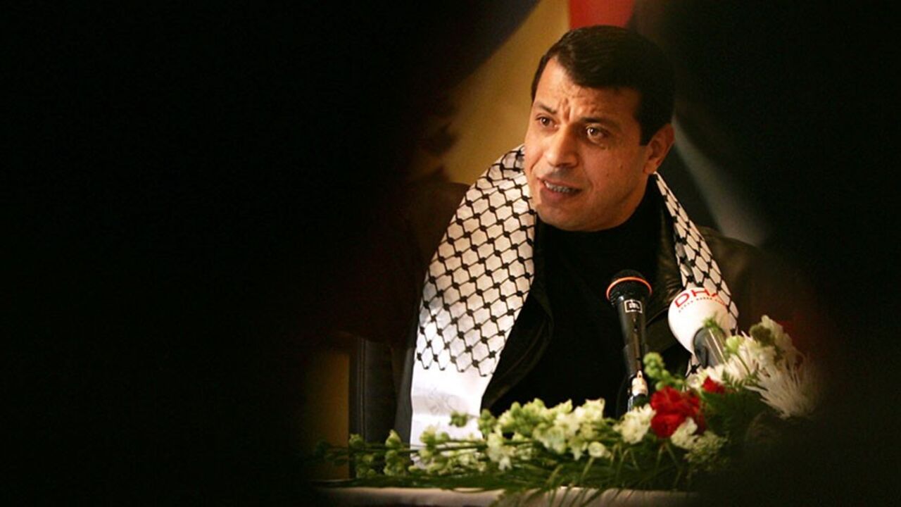 MIDEAST Fatah faction leader Mohammed Dahlan addresses the media during a news conference in the West Bank city of Ramallah January 15, 2006. Israel's cabinet on Sunday approved voting in Arab East Jerusalem in a January 25 Palestinian parliamentary election but said it would ban the militant Hamas group from listing its candidates on ballots there. REUTERS/Loay Abu Haykel - RTR1BTKM