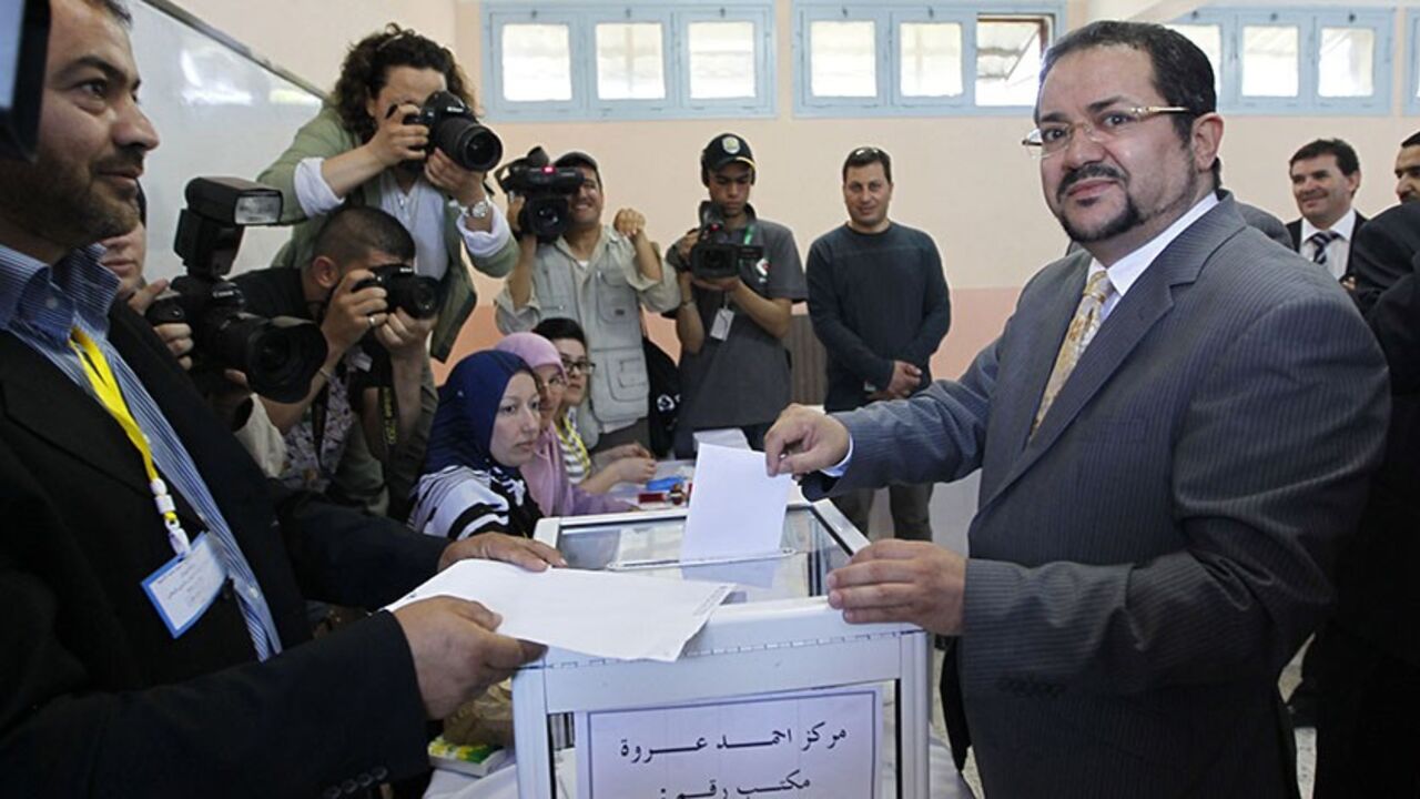 ALGERIA-VOTE Abdelmadjid Menasra, leader of the Islamist party Front of Change (FC), casts his ballot during parliamentary elections at a polling station in Algiers May 10, 2012. Algerians voted on Thursday for a new parliament that officials say will bring democracy to a country left behind by the "Arab Spring" revolts, but many people showed their scepticism by abstaining. REUTERS/Louafi Larbi (ALGERIA - Tags: POLITICS ELECTIONS) - RTR31UYV