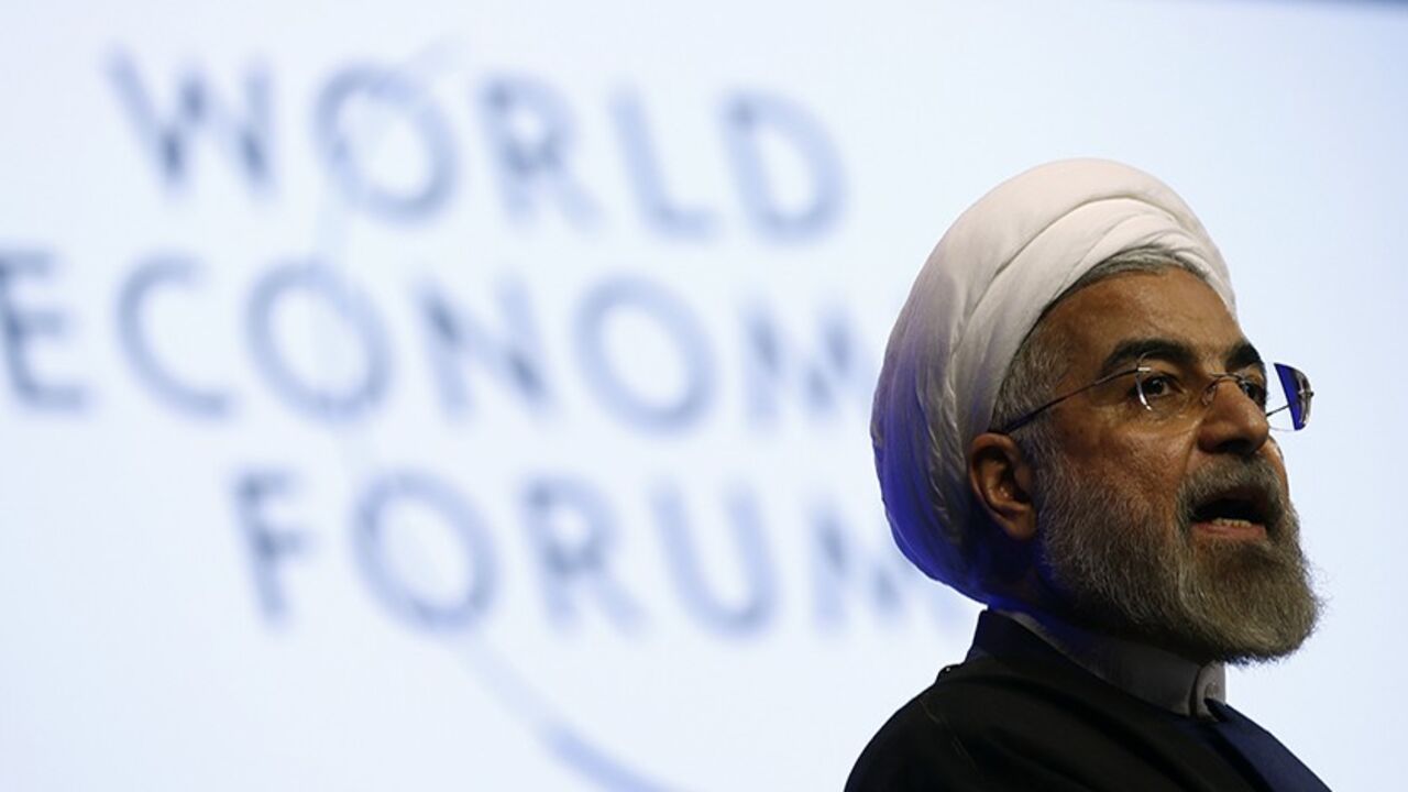 DAVOS/ Iran's President Hassan Rouhani speaks during a session at the annual meeting of the World Economic Forum (WEF) in Davos January 23, 2014. REUTERS/Denis Balibouse (SWITZERLAND - Tags: POLITICS BUSINESS HEADSHOT) - RTX17QZY