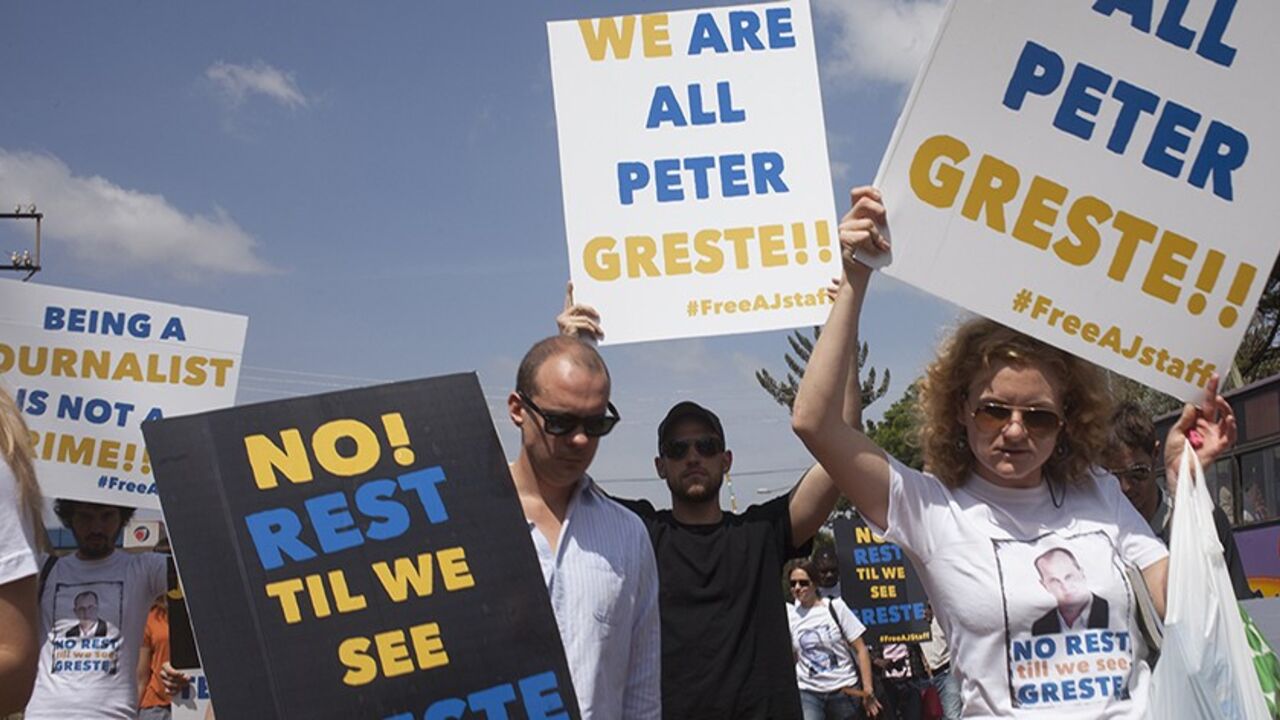 EGYPT-ALJAZEERA/ Journalists from the foreign correspondence organisation participate in a protest demanding the release of four Al Jazeera correspondents outside the Egyptian Embassy premises in Kenya's capital Nairobi February 4, 2014. Three of the Qatar-based television network's journalists - Peter Greste, an Australian; Mohamed Fahmy, a Canadian-Egyptian national; and Baher Mohamed - were detained in Cairo on Dec. 29 and remain in custody, Al Jazeera said. REUTERS/George Philipas (KENYA - Tags: CRIME LAW POLITICS MEDIA