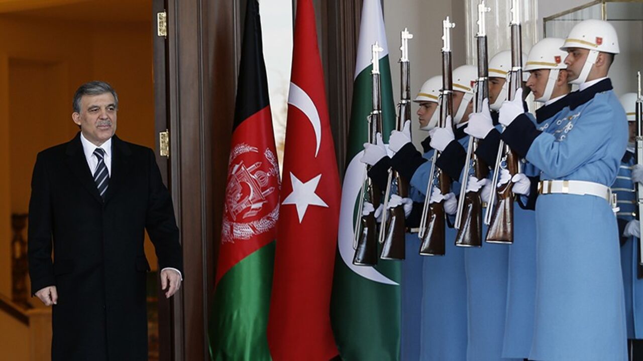 TURKEY/ Turkish President Abdullah Gul waits for his guests at the Turkey-Afghanistan-Pakistan Trilateral Summit at the Presidential Palace in Ankara February 13, 2014. REUTERS/Umit Bektas (TURKEY - Tags: POLITICS) - RTX18PWR