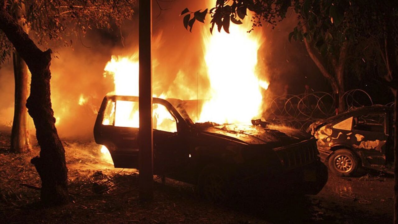 Cars burn at the site of an explosion in the Shi'ite town of Hermel February 22, 2014. A suicide bomber killed two Lebanese soldiers with a car bomb near an army checkpoint in a Hezbollah stronghold in northeast Lebanon on Saturday, security sources said.The latest bombing, in a country destabilised by the civil war in neighbouring Syria, was the third such attack in recent weeks in Hermel, a predominantly Shi'ite Muslim area near the border with Syria. Fifteen people were wounded. REUTERS/Rami Bleibel (LEB