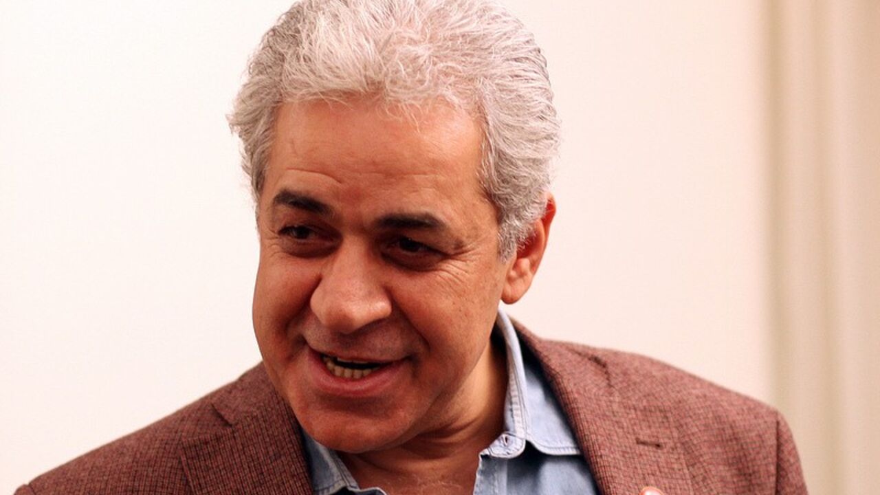 Leftist leader Hamdeen Sabahi speaks during an interview with Reuters Leftist leader Hamdeen Sabahi speaks during an interview with Reuters in Cairo, April 29, 2013. Egypt should refuse a $4.8 billion loan from the International Monetary Fund rather than submit to terms that would further impoverish the poor and could spark a revolution of the hungry, Sabahi said on Monday. REUTERS/Asmaa Waguih (EGYPT - Tags: POLITICS) - RTXZ42R