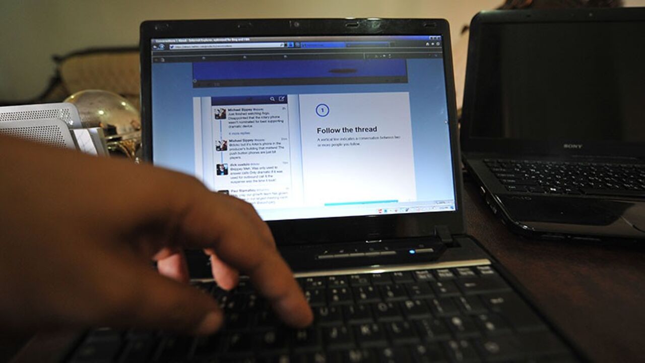 Nic6252878 TO GO WITH AFP STORY BY ASAAD ABBOUD
A Saudi man prepares to login into his Twitter account on his laptop on October 6, 2013 at his office in Riyadh. Despite sitting on the world's largest wealth of oil, Saudis complain their salaries are not enough to make ends meet, and have taken to Twitter demanding better income. AFP PHOTO/FAYEZ NURELDINE (Photo credit should read FAYEZ NURELDINE/AFP/Getty Images)