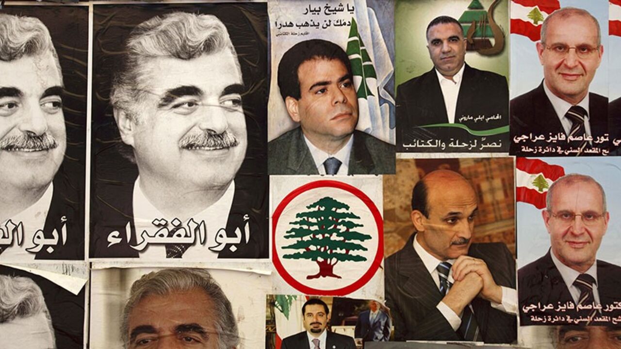 LEBANON/ Future Movement campaign posters featuring members of the "March 14" Alliance are displayed on the walls of a tent in the Bekka Valley village of Qabb Elias June 5, 2009. Lebanese vote on June 7 in a parliamentary election that pits the powerful Shi'ite group Hezbollah and its allies against an anti-Syrian alliance that won a 2005 poll. The vote will determine the shape of parliament and government until 2013. REUTERS/Steve Crisp (LEBANON ELECTIONS POLITICS) - RTR24BIR