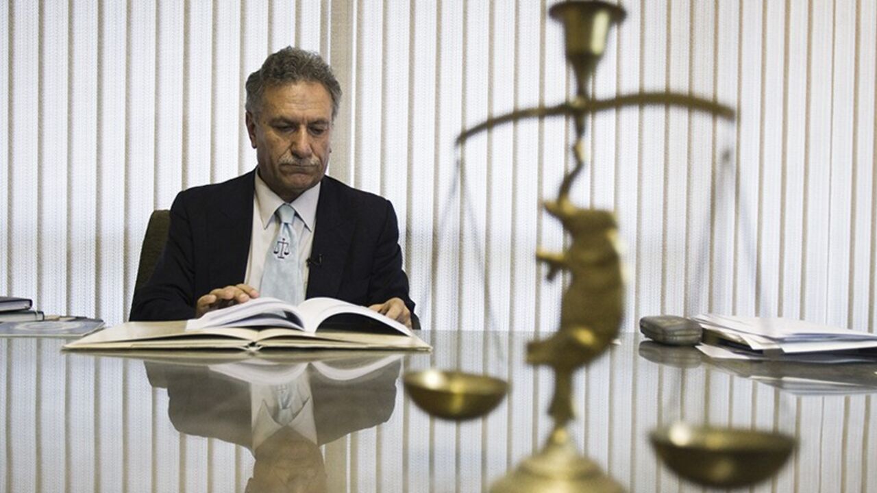 IRAN-COURT/PASTOR EDITORS' NOTE: Reuters and other foreign media are subject to Iranian restrictions on their ability to film or take pictures in Tehran.
Mohammad Ali Dadkhah, lawyer of Yousef Nadarkhani who was sentenced to death for apostasy, is interviewed by Reuters in his office in Tehran October 3, 2011. REUTERS/Raheb Homavandi (IRAN - Tags: CRIME LAW POLITICS RELIGION TPX IMAGES OF THE DAY) - RTR2S62X